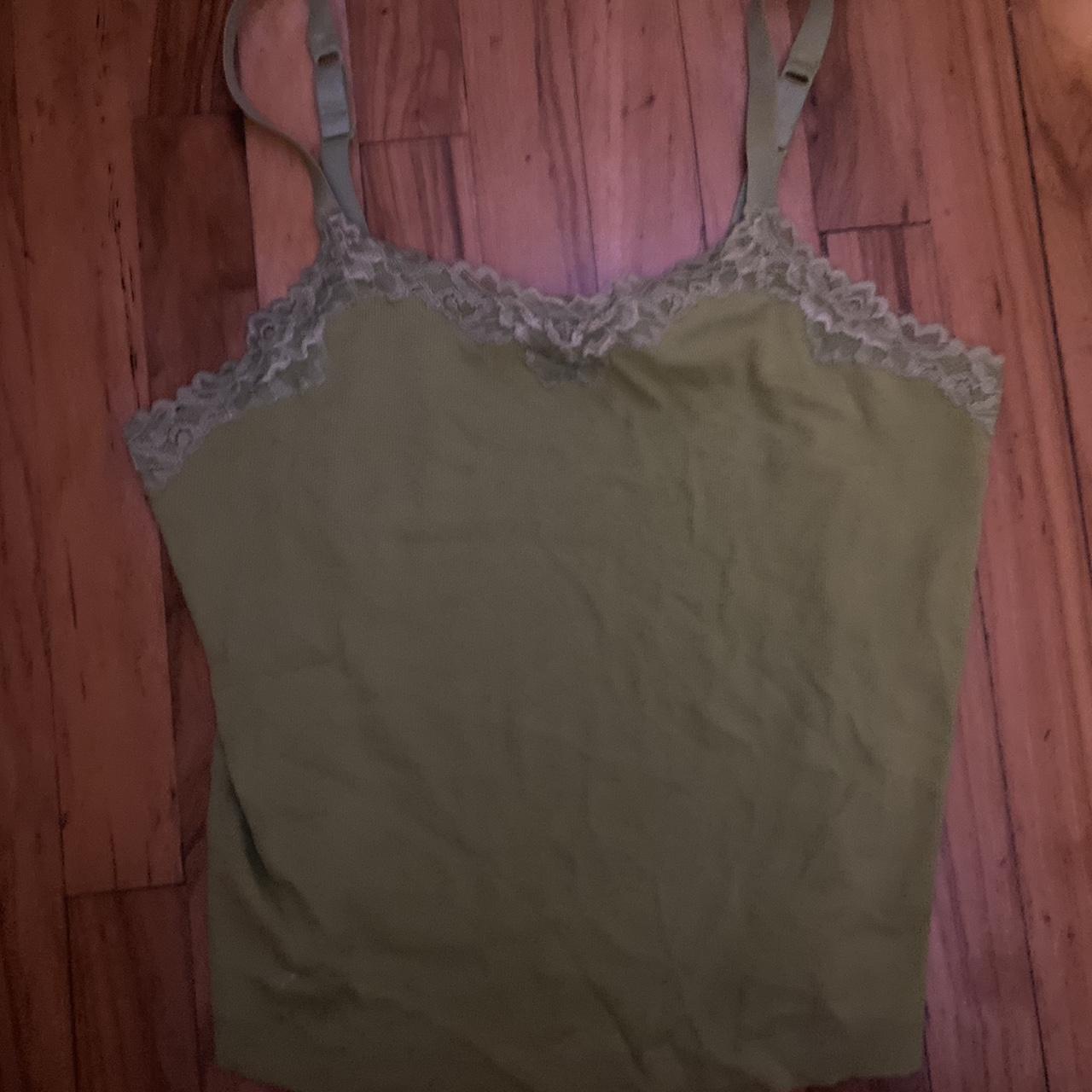 Green loose top. Doesn’t fit me well but still cute.... - Depop