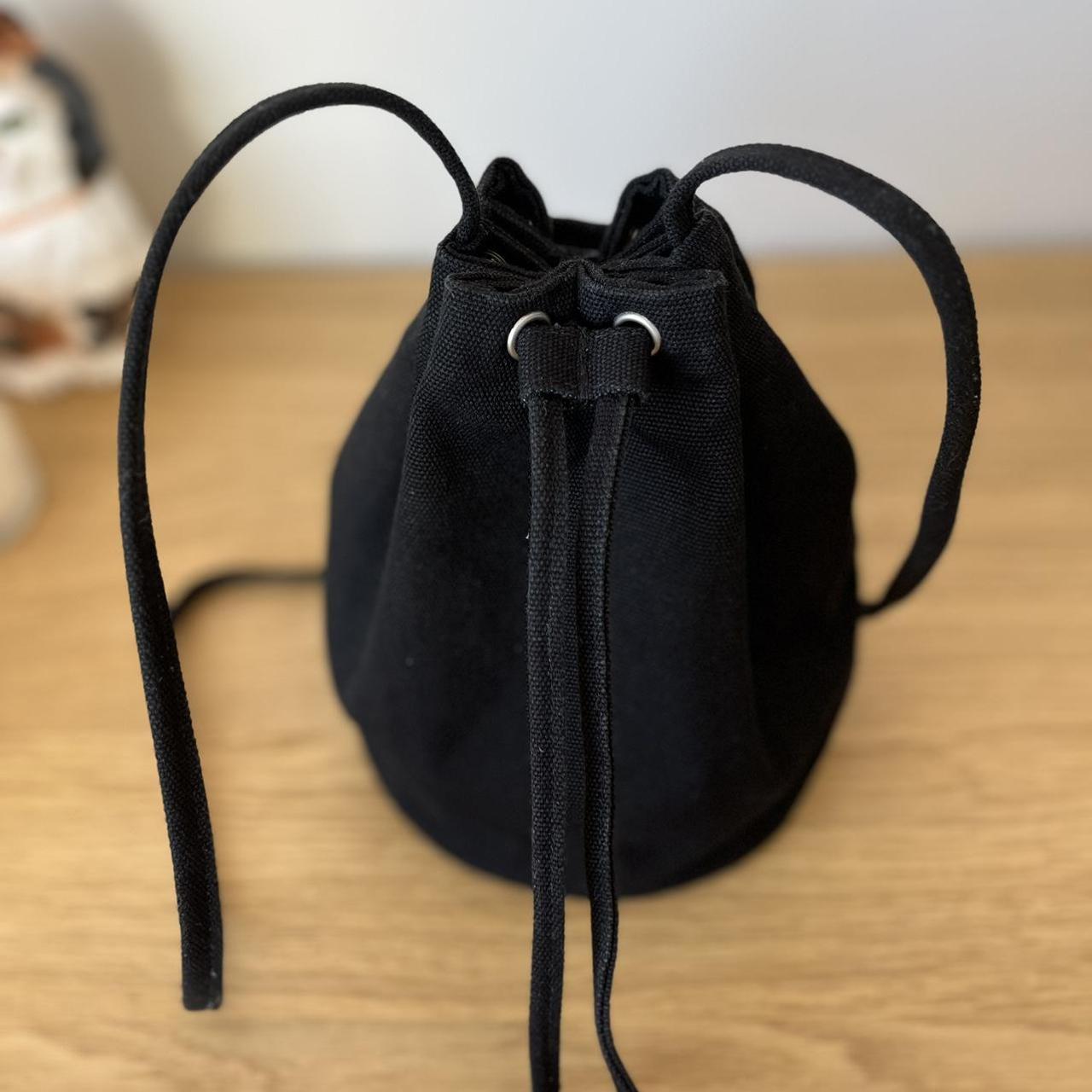 Black canvas Baggu brand bucket bag purse. Strap is... Depop