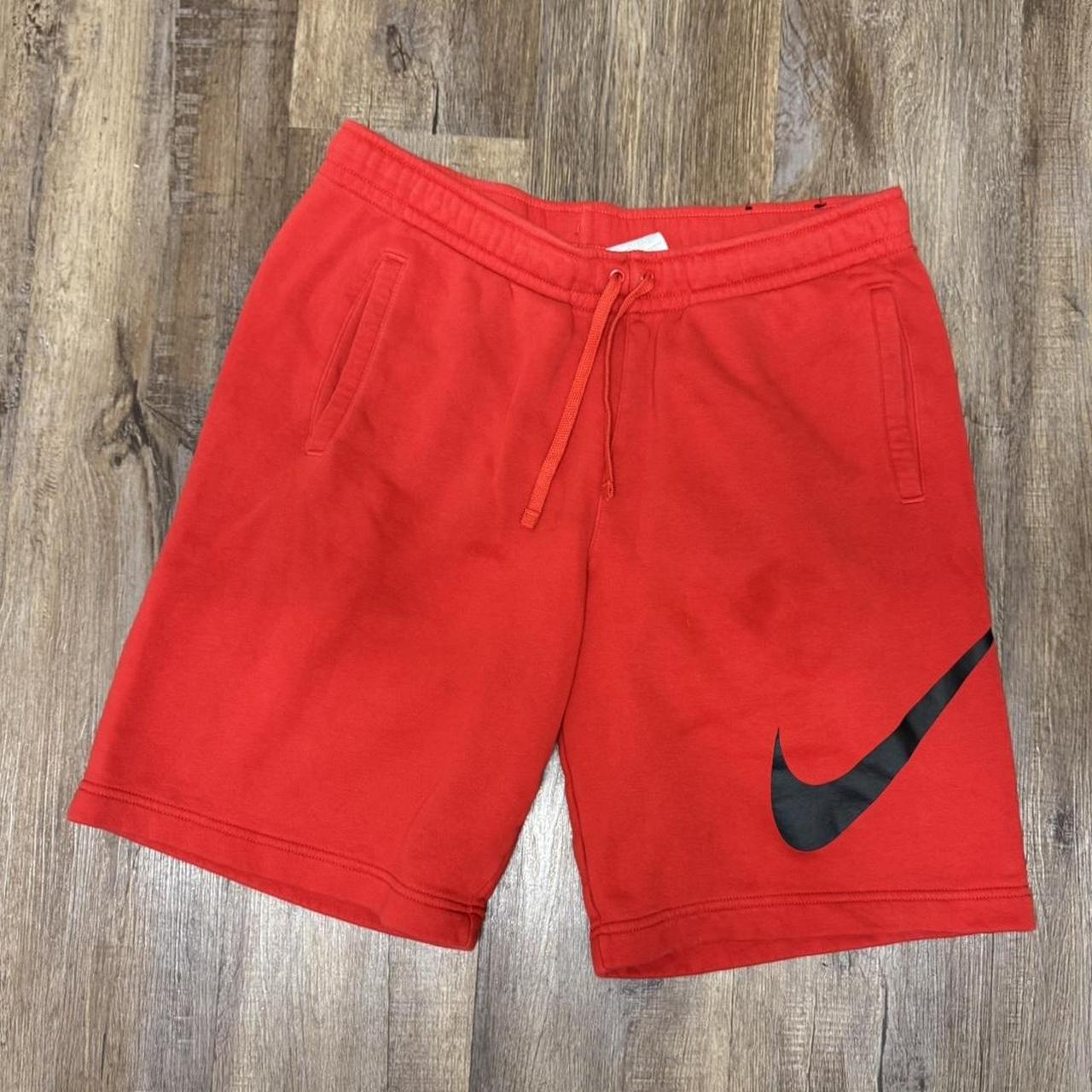 nike red and black shorts
