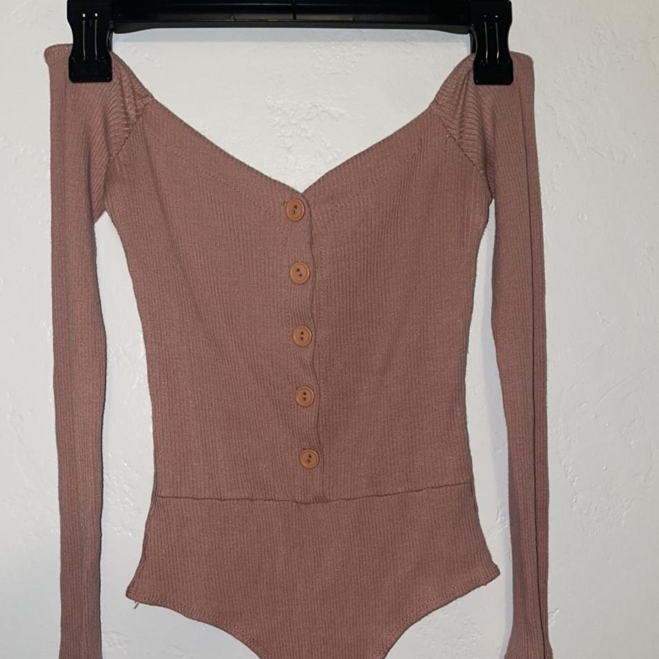 This is a fashion nova longsleeve body suit. All... Depop