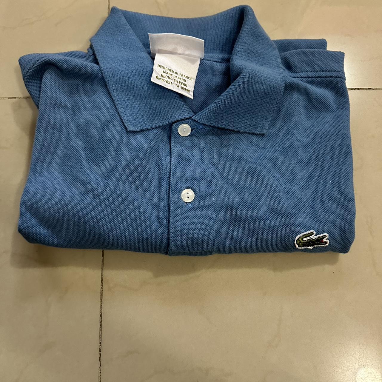 Lacoste polo shirt Baby blue Size 4 M Depop