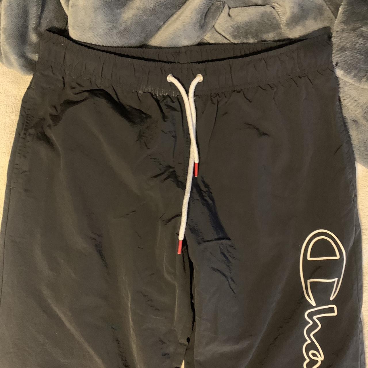 Champion parachute pants large - Depop