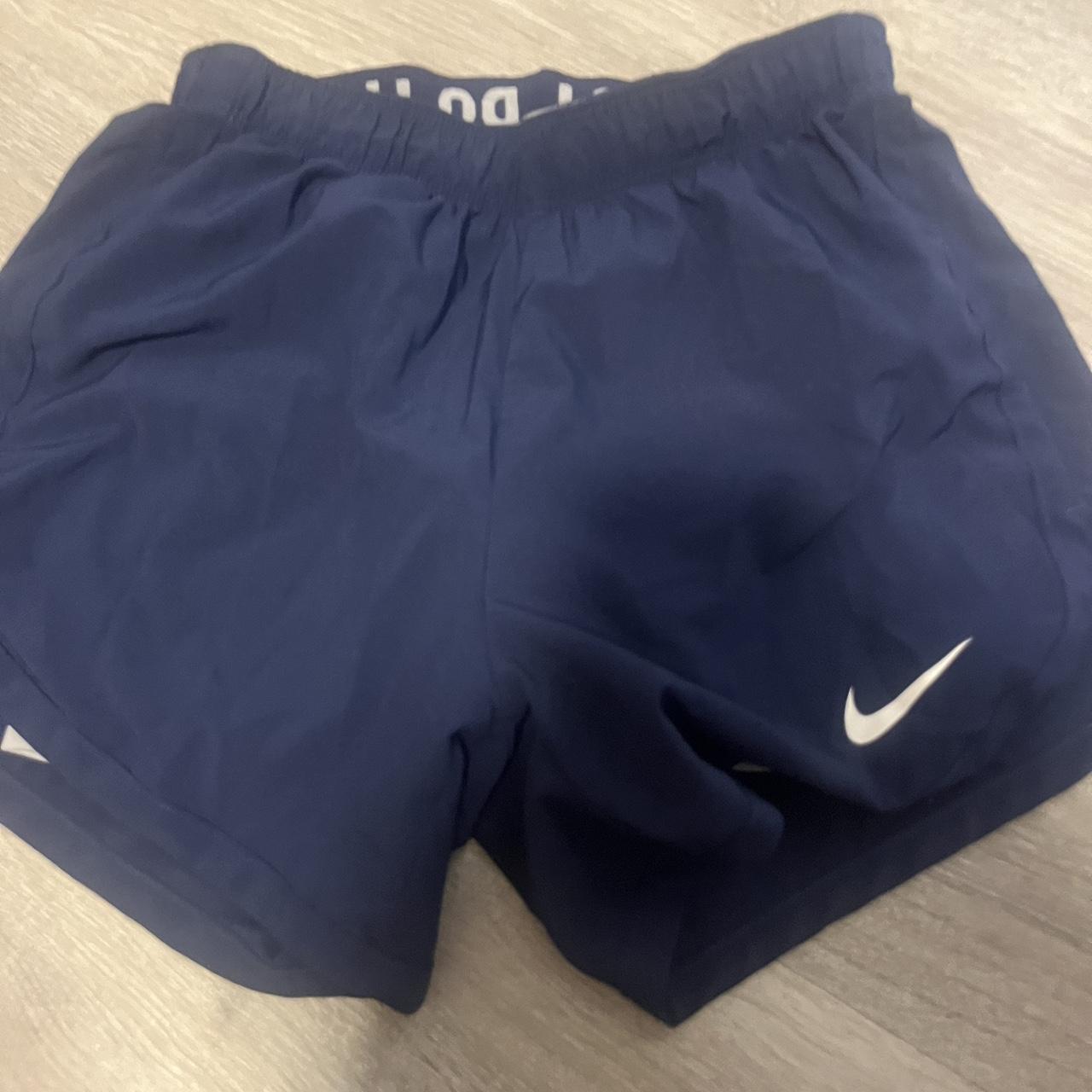 blue nike shorts with spandex inside good condition