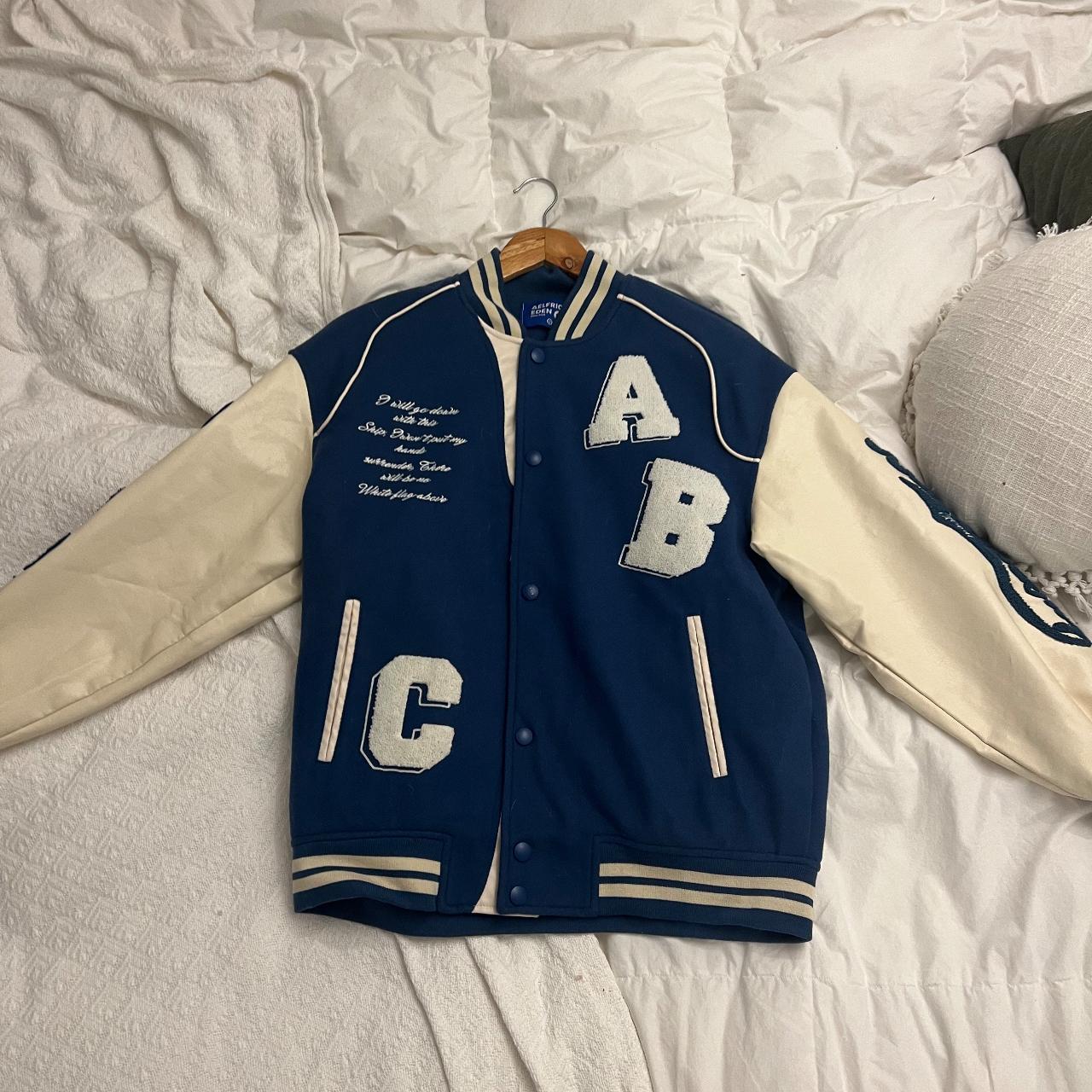 Blue and white unisex varsity jacket, only worn once - Depop