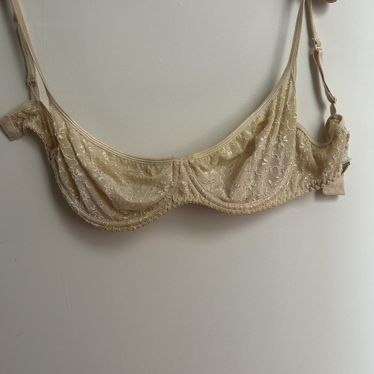 vintage Vogue bra with embroidered flowers... Depop