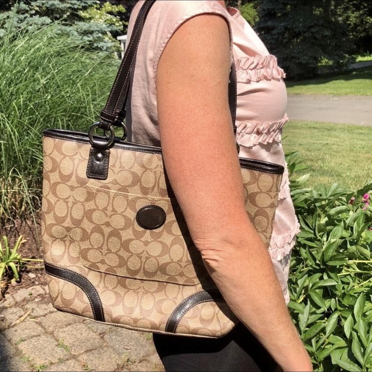 Brown and tan coach purse lightly used like new