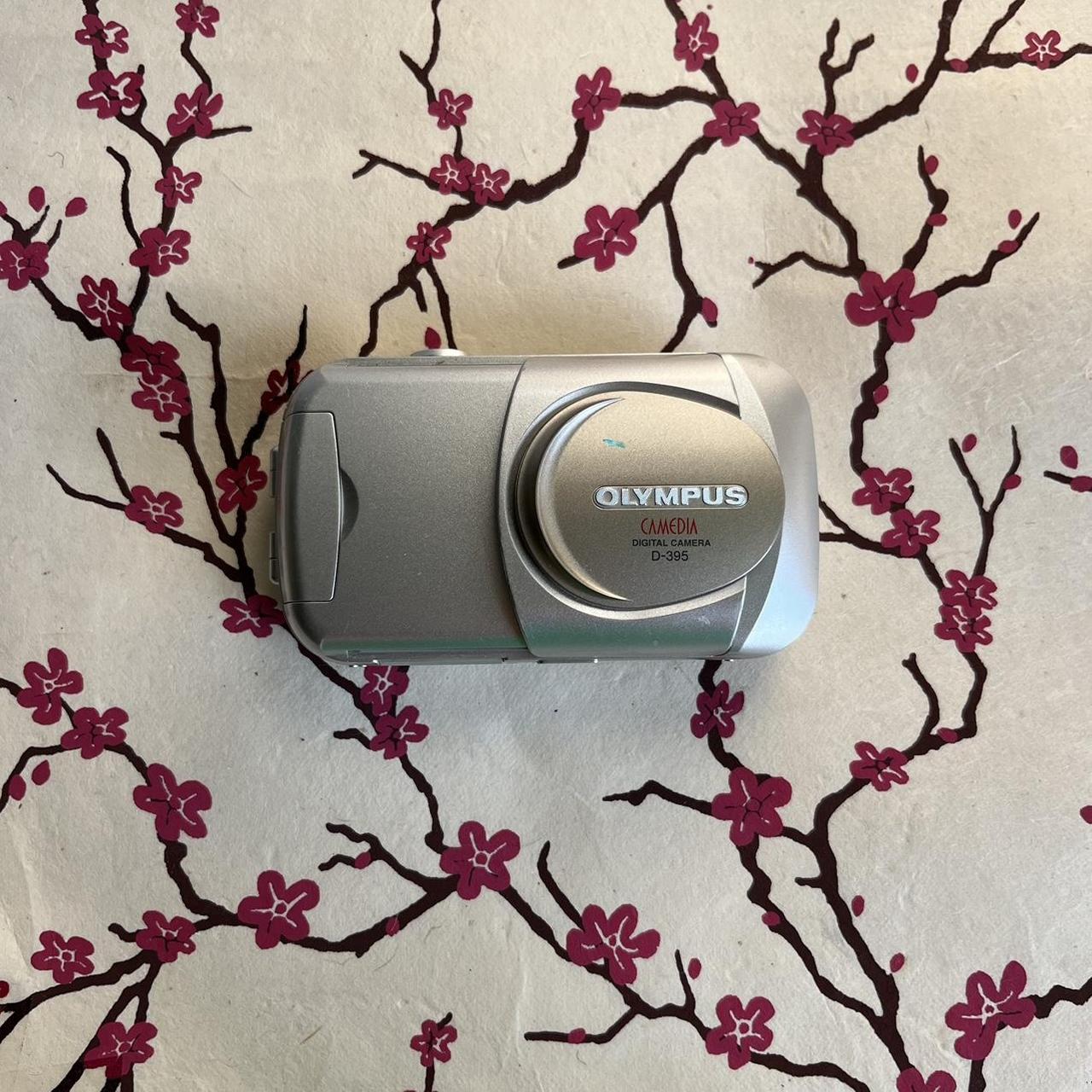 Olympus Camedia D395 Features 3 MP ½.7”... Depop