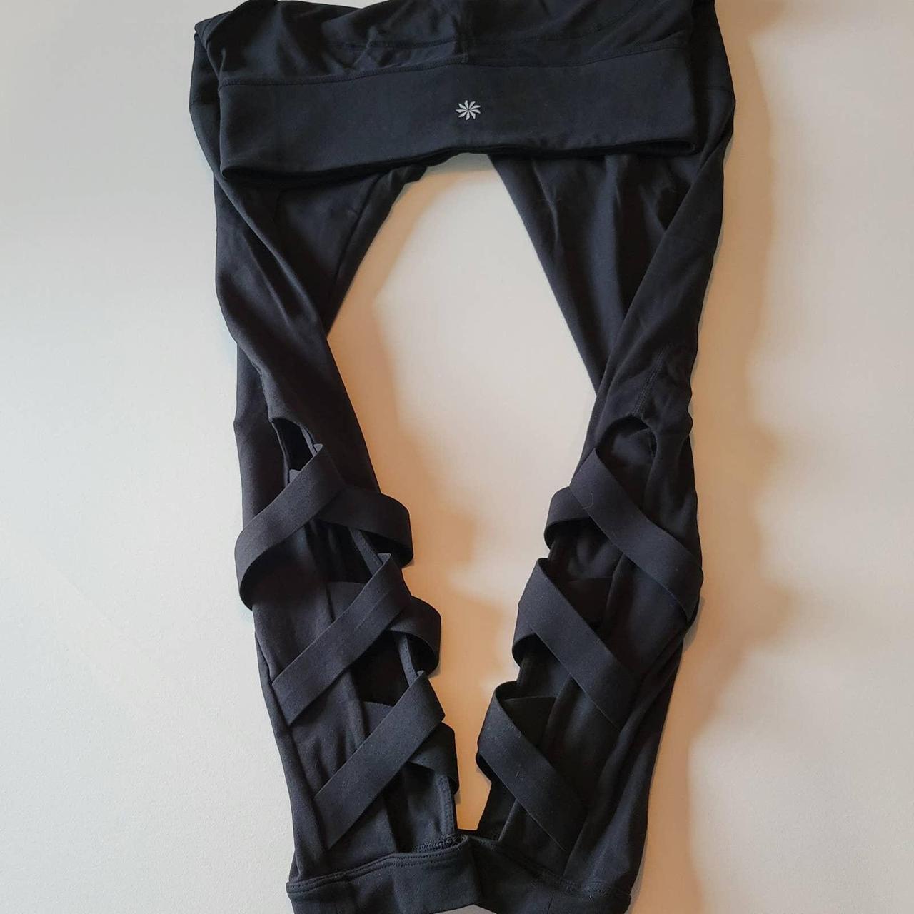Athleta leggings with criss cross cut out on back of - Depop