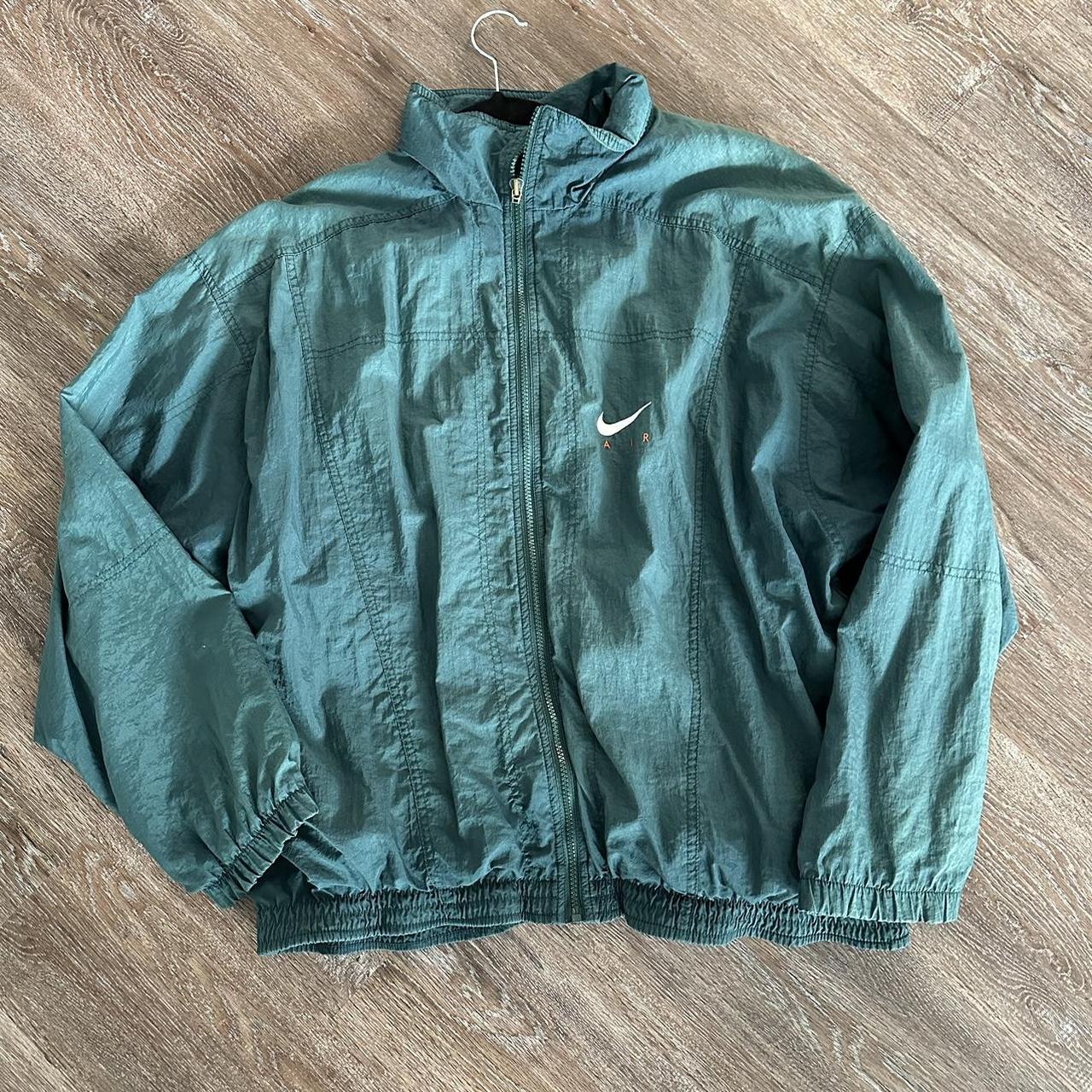 dark green nike windbreaker