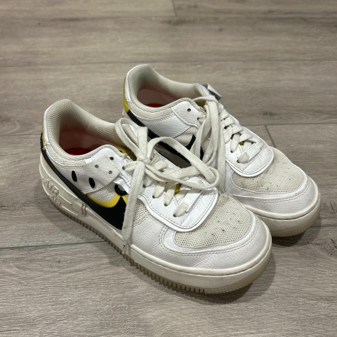 Smiley face Nike Air Force 1 s slight wear on back