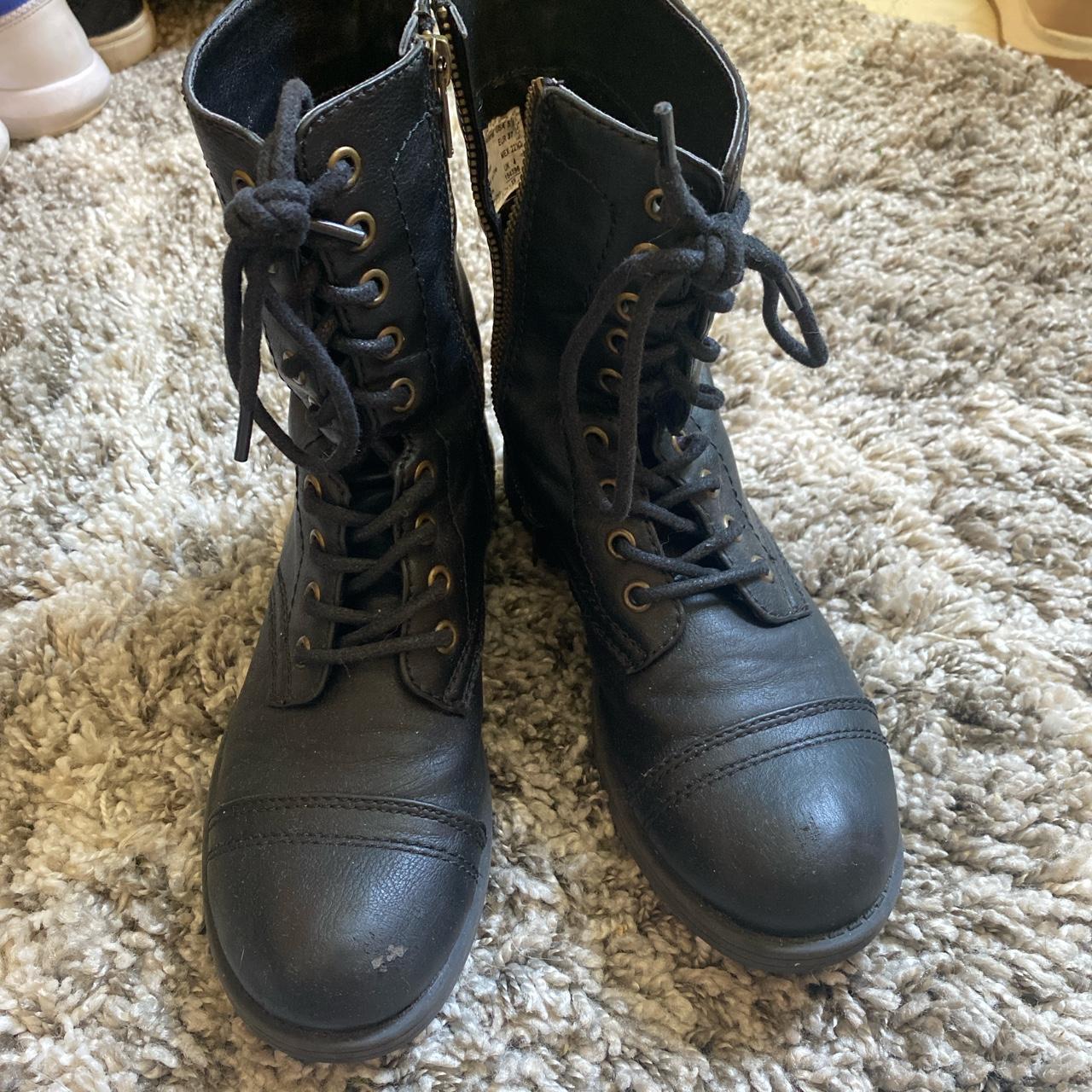 Black Combat boots. There are creases and stretches.... - Depop