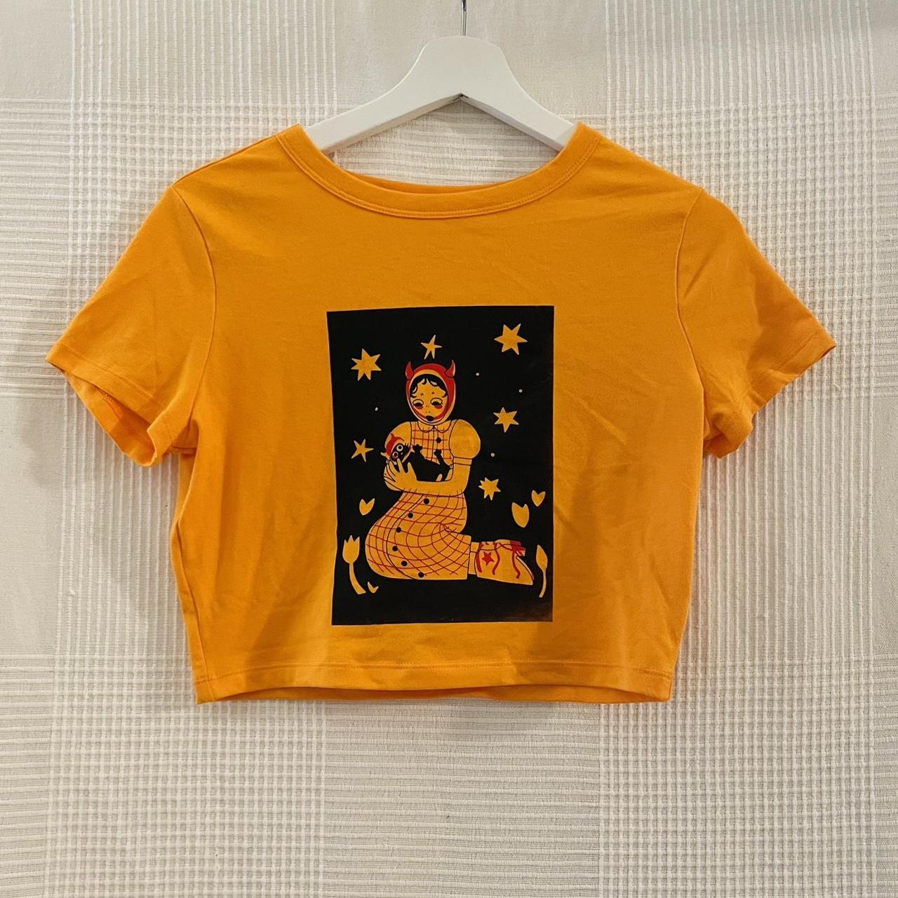 Custom screen printed orange crop top. This is one... Depop
