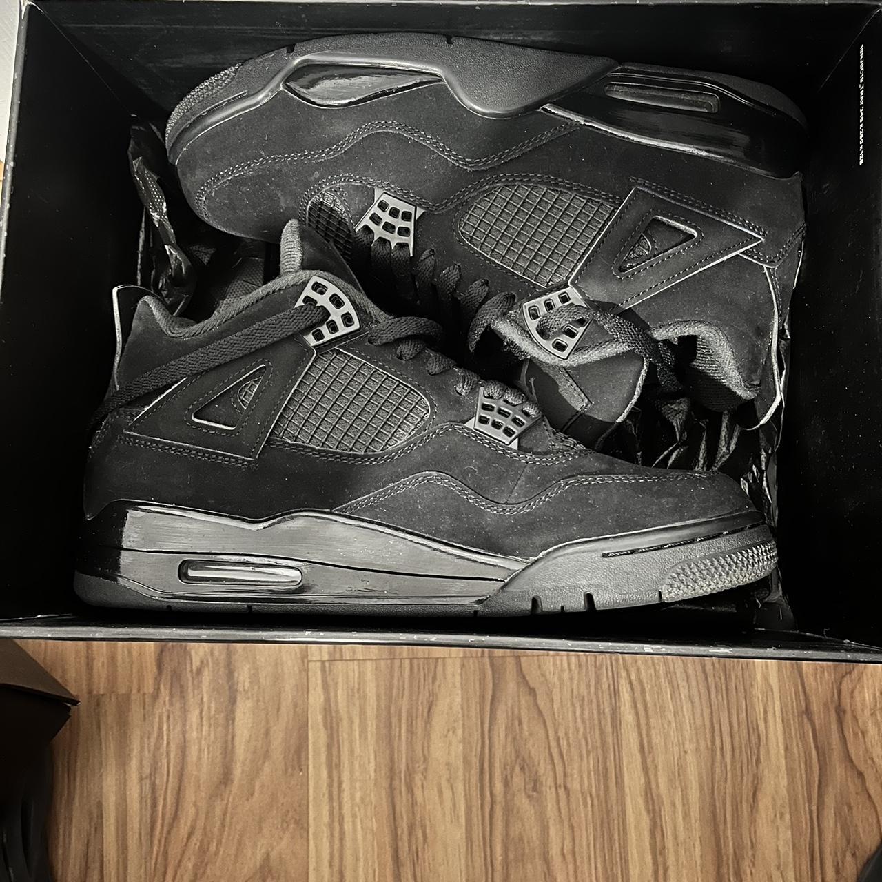 mens black cat 4s