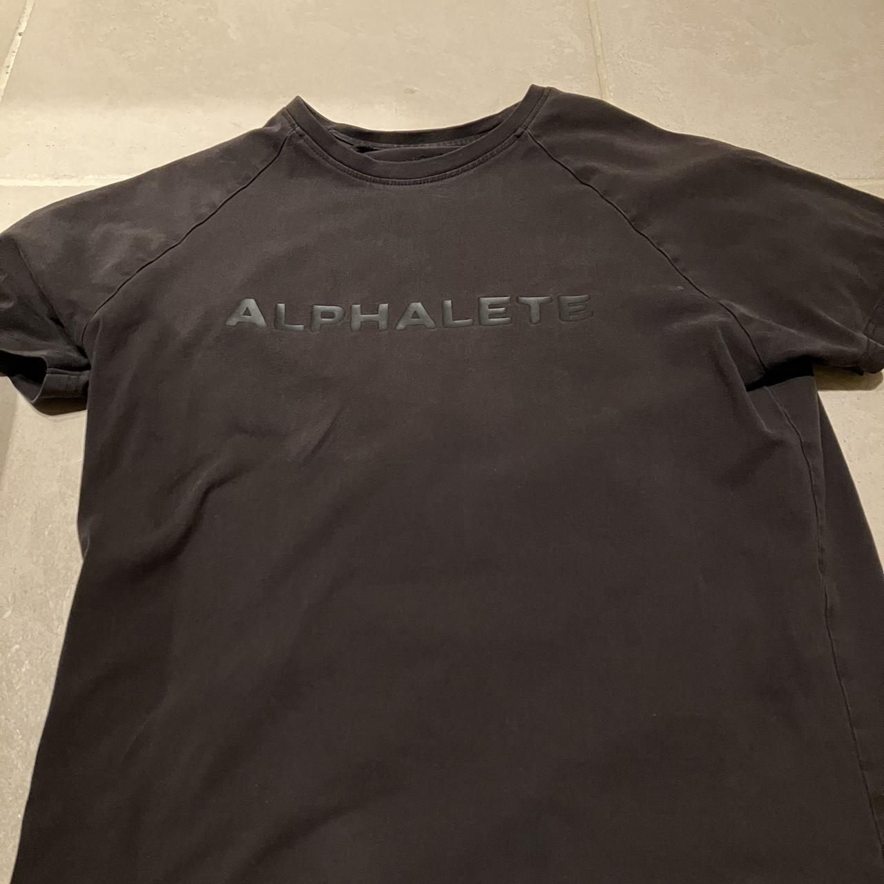 Alphalete gym trainer tee in black with branding... Depop