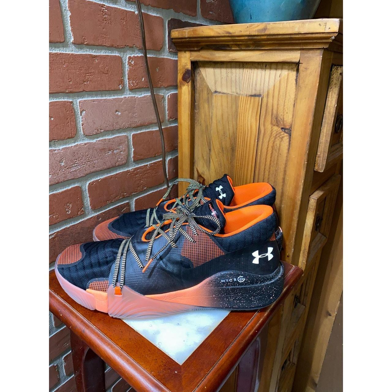 Black and orange under armour basketball shoes hotsell