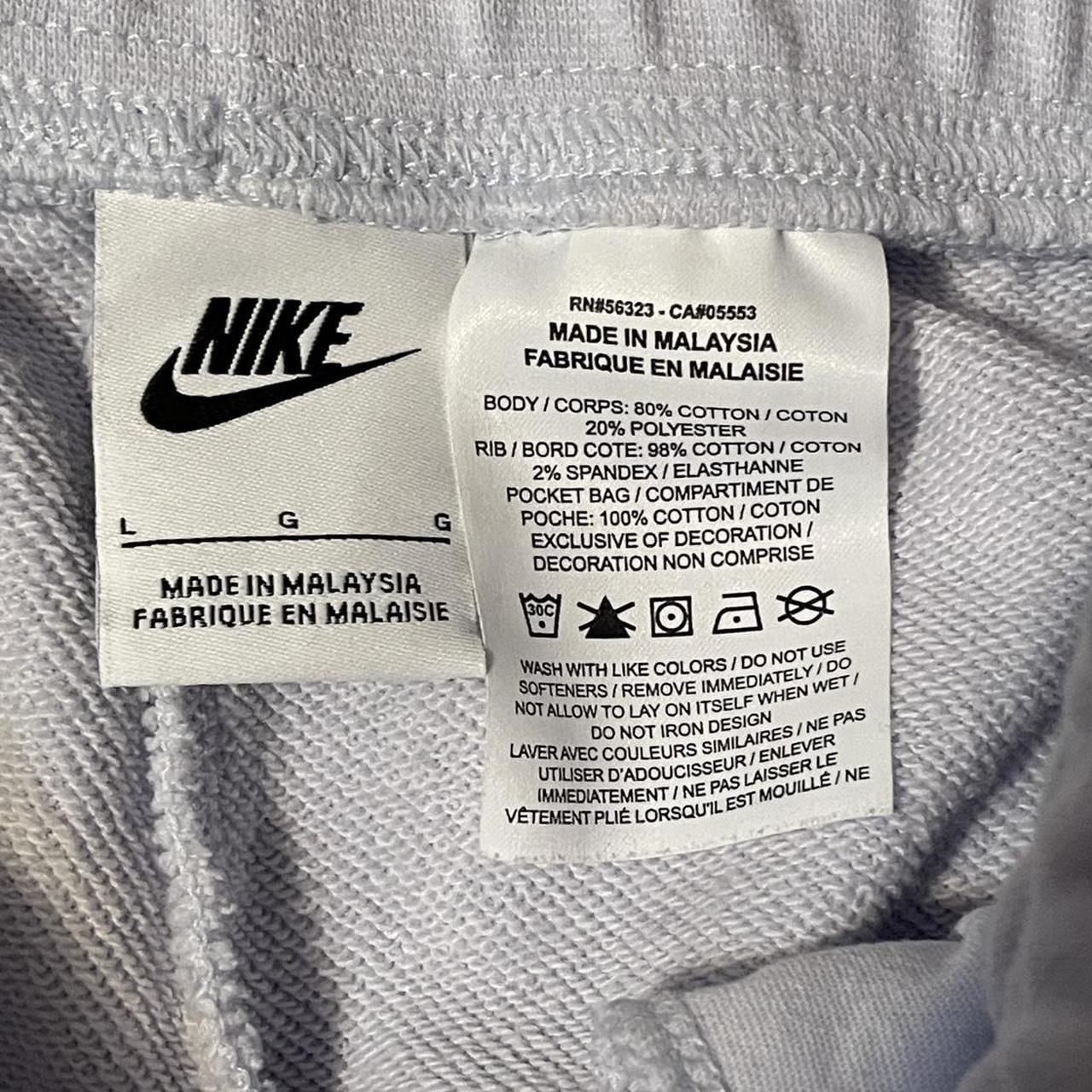 Light blue Nike kids shorts size L fits like a... Depop
