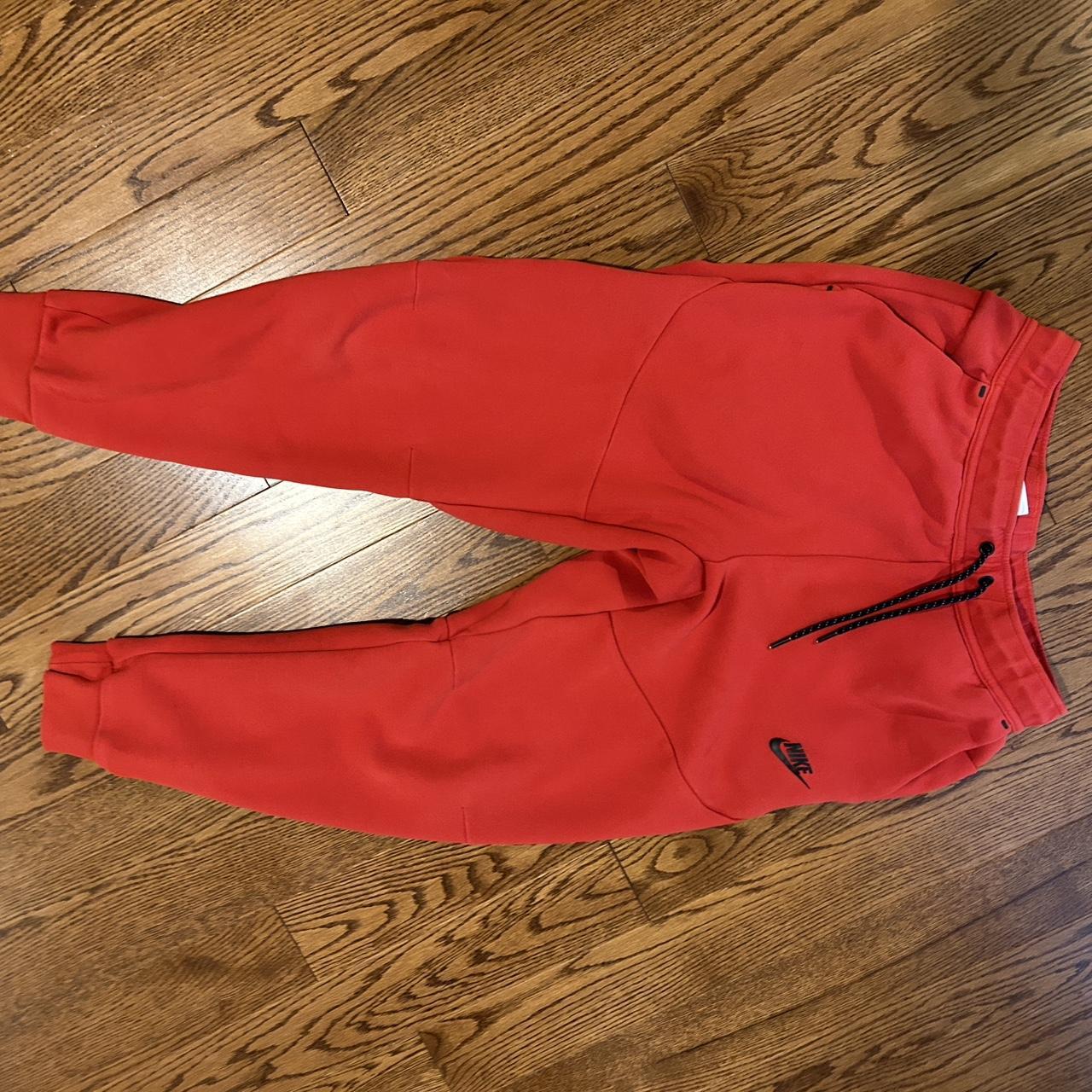 Red Nike Tech Pants Lightly used no visible Depop