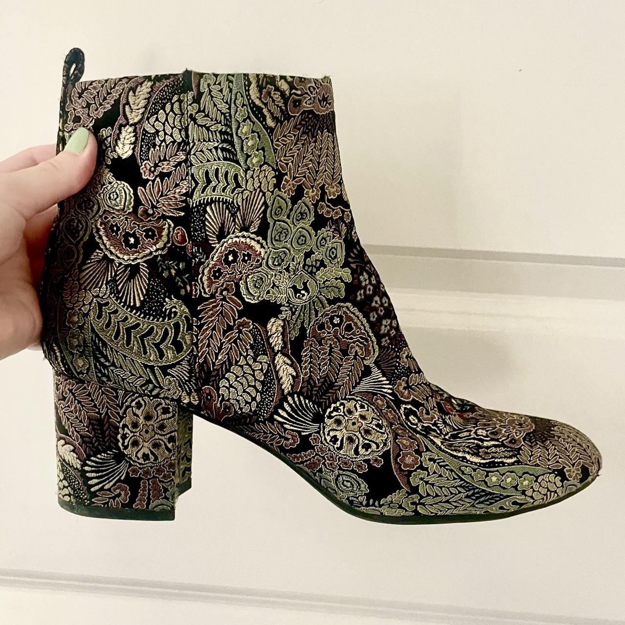 black boots with red heel