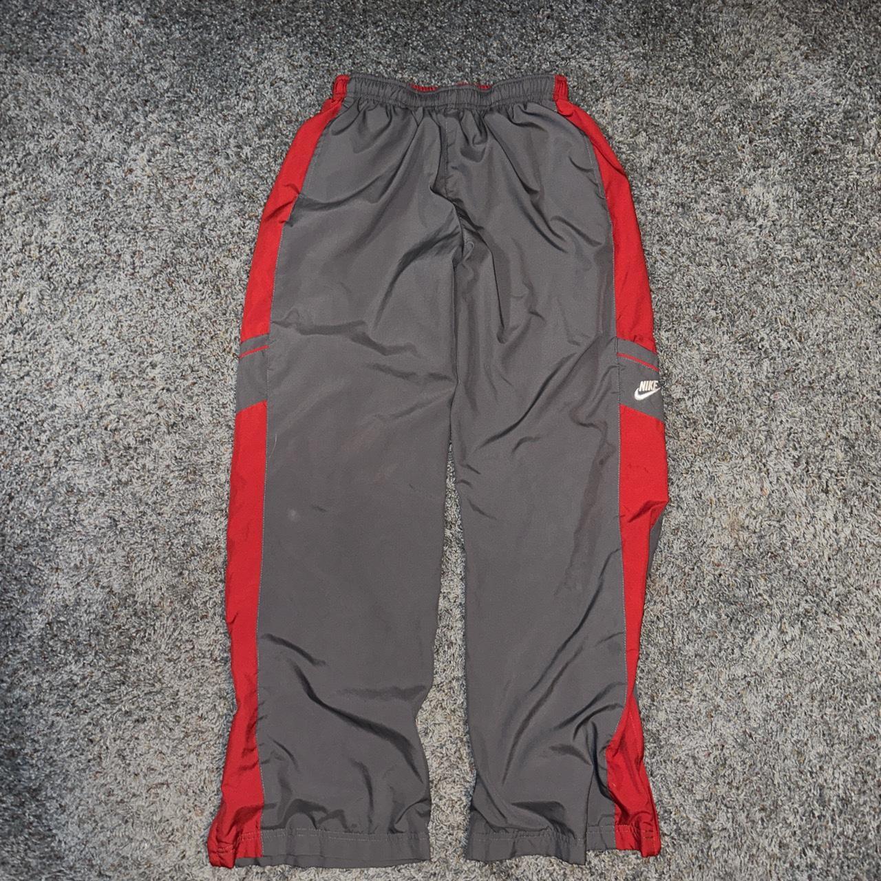 Red nike sale windbreaker pants