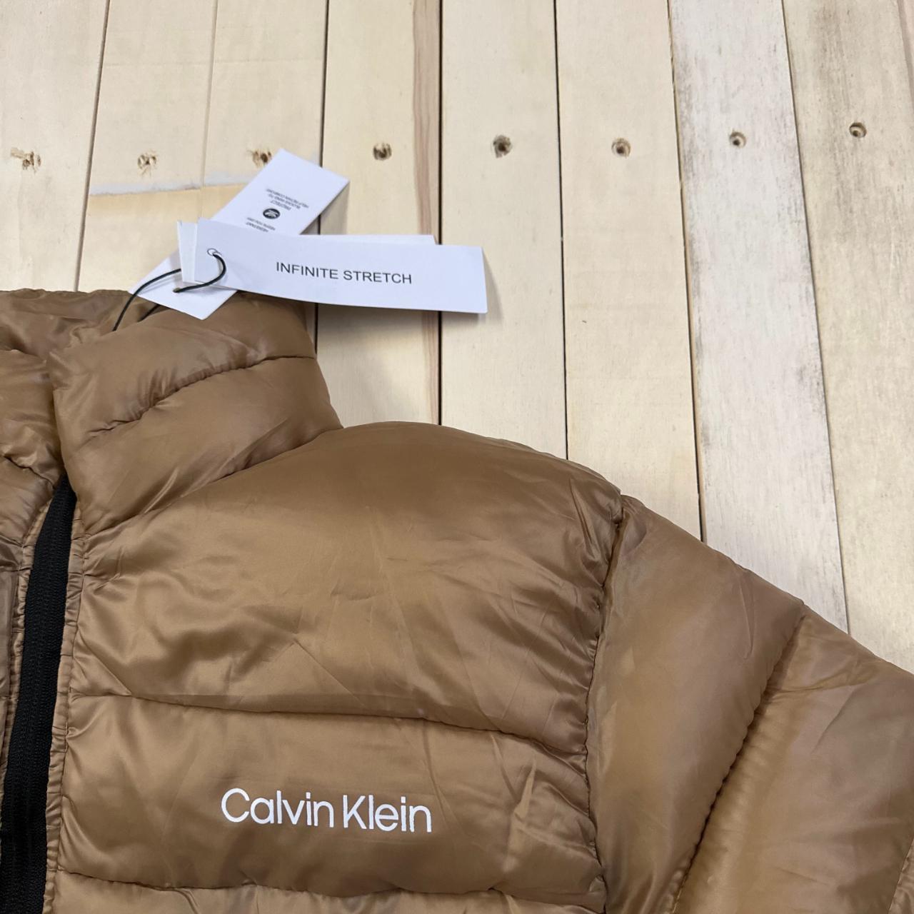 Calvin Klein® Puffer Jacket Gold Color INFINITE... - Depop