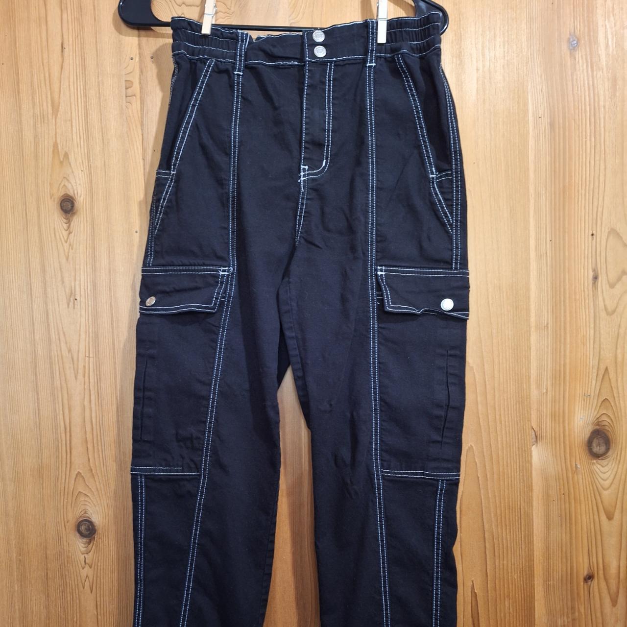 Black Cargo Pants with White stitching. Womens size... Depop
