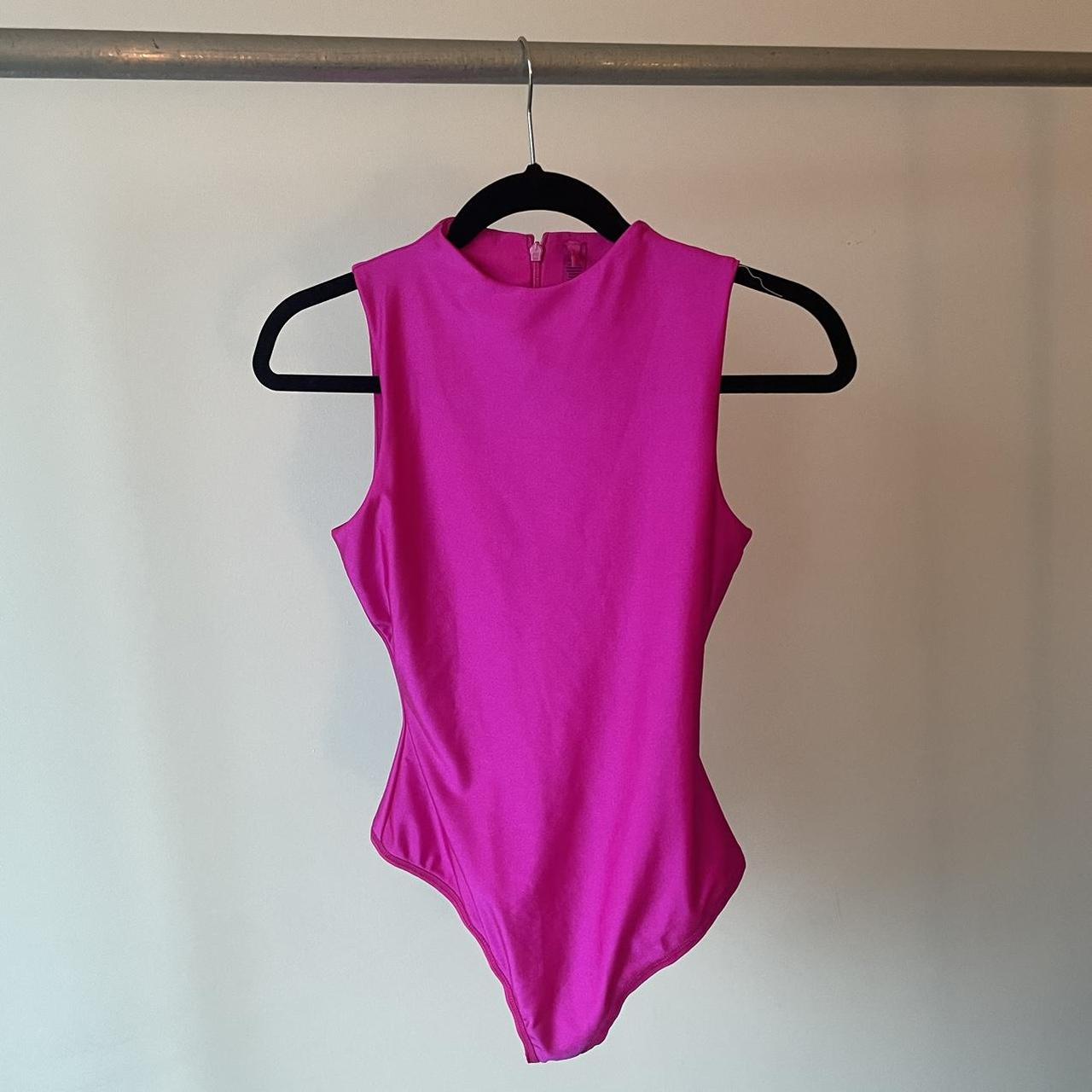 Skims Disco Mock Neck Bodysuit in Hot Pink Est. - Depop
