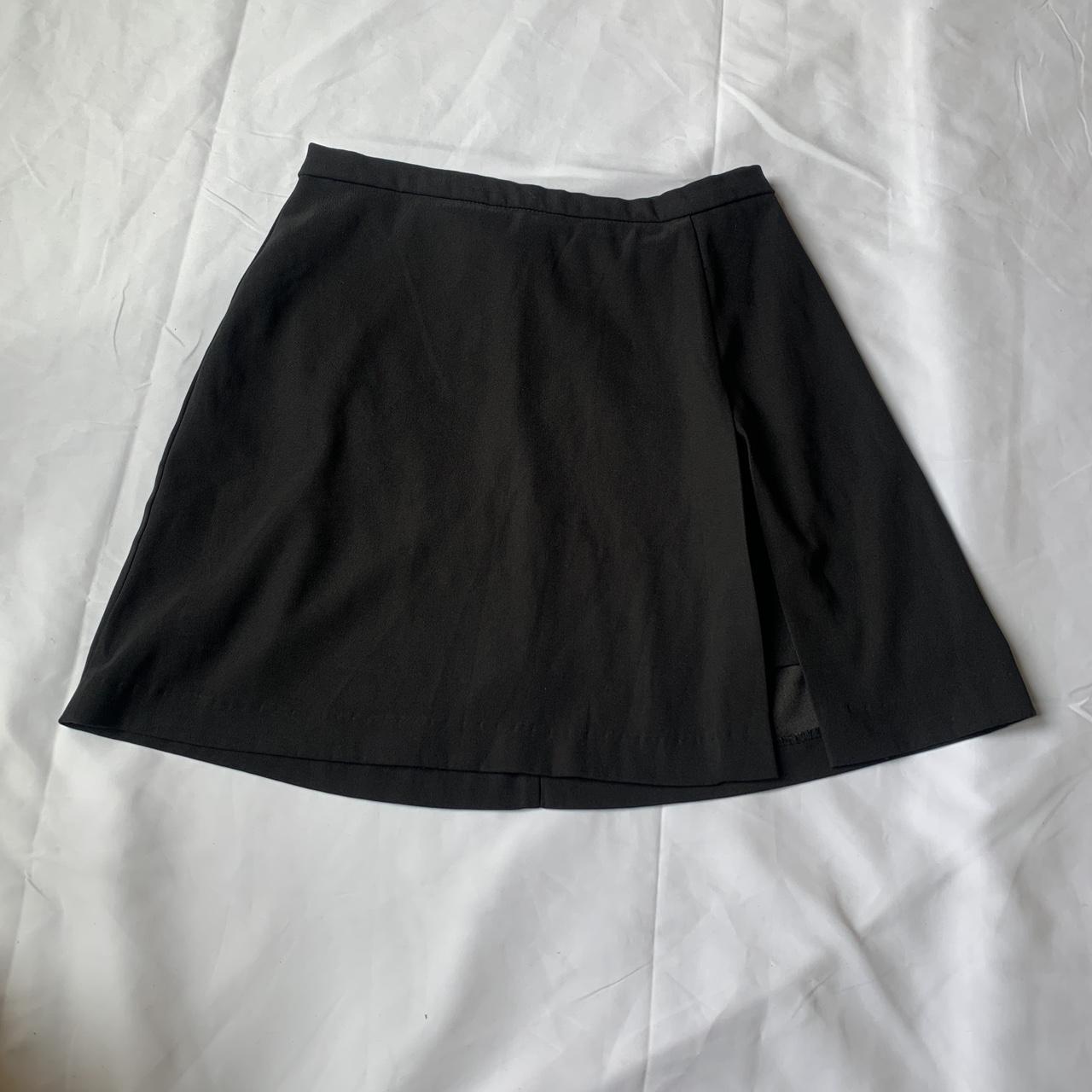 Black mini skirt with small slit and zipper size... - Depop