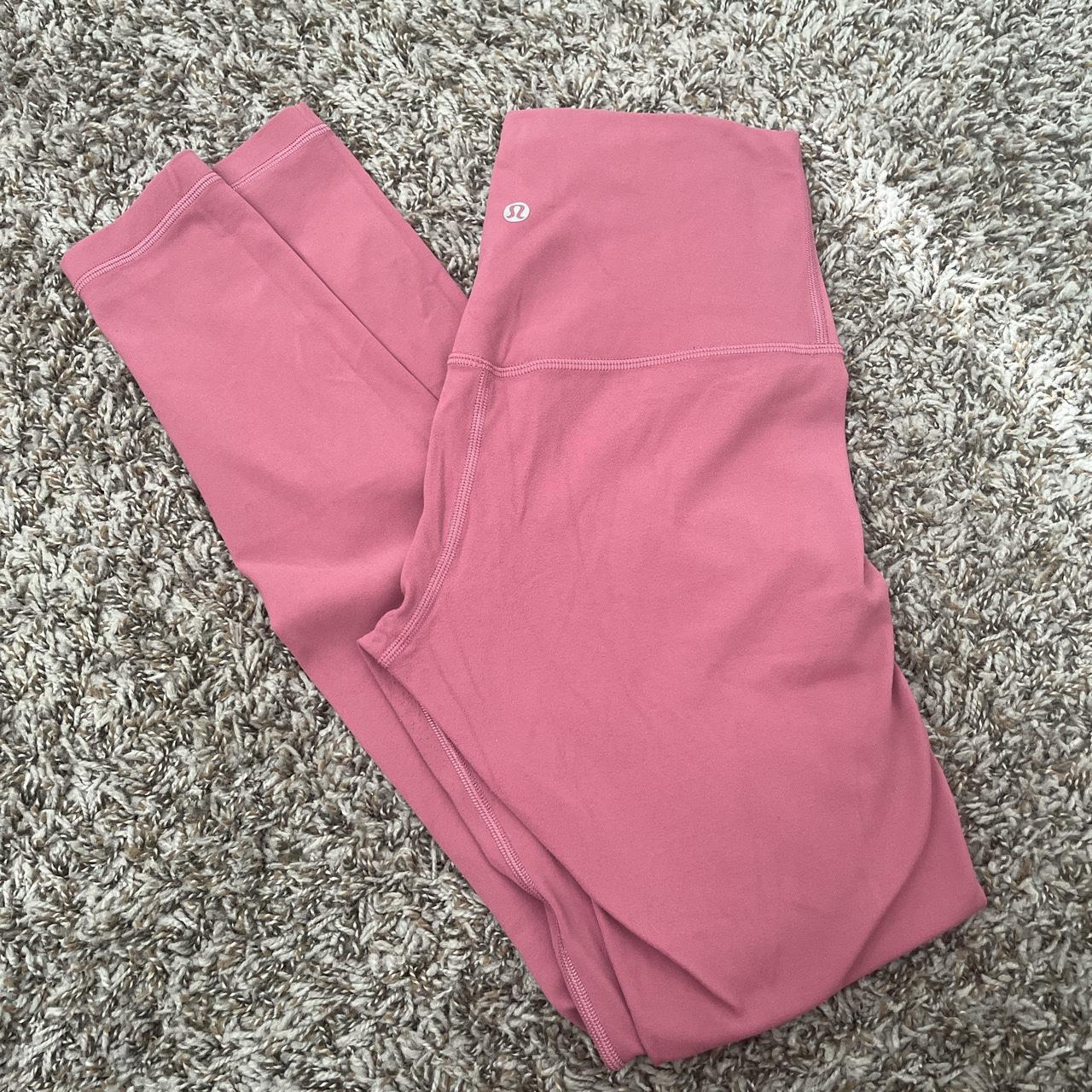 Pink Lululemon 28” length. Size 4. Slight pill... - Depop