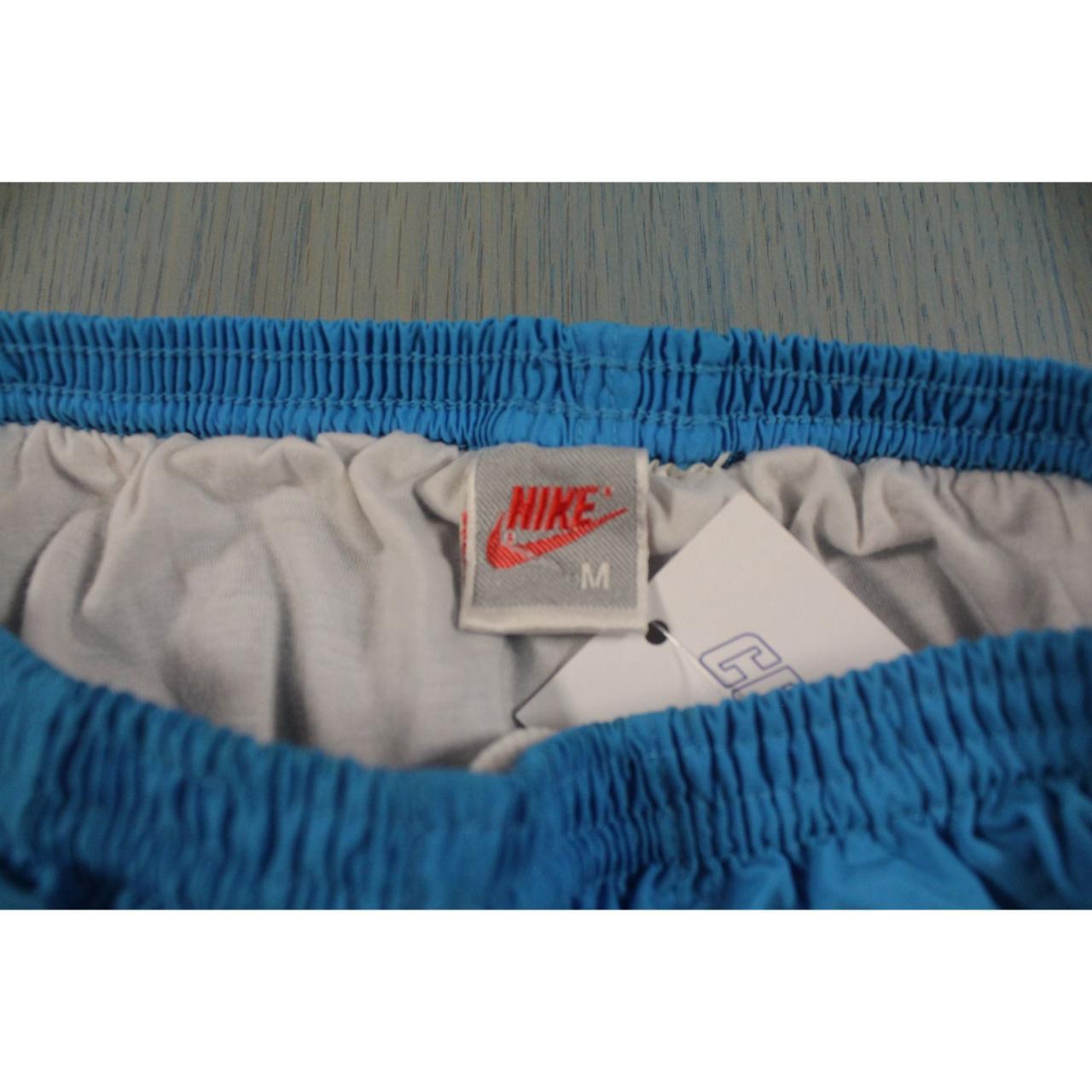 Vintage 90s Nike Baby Blue Swoosh Athletic Shorts... Depop