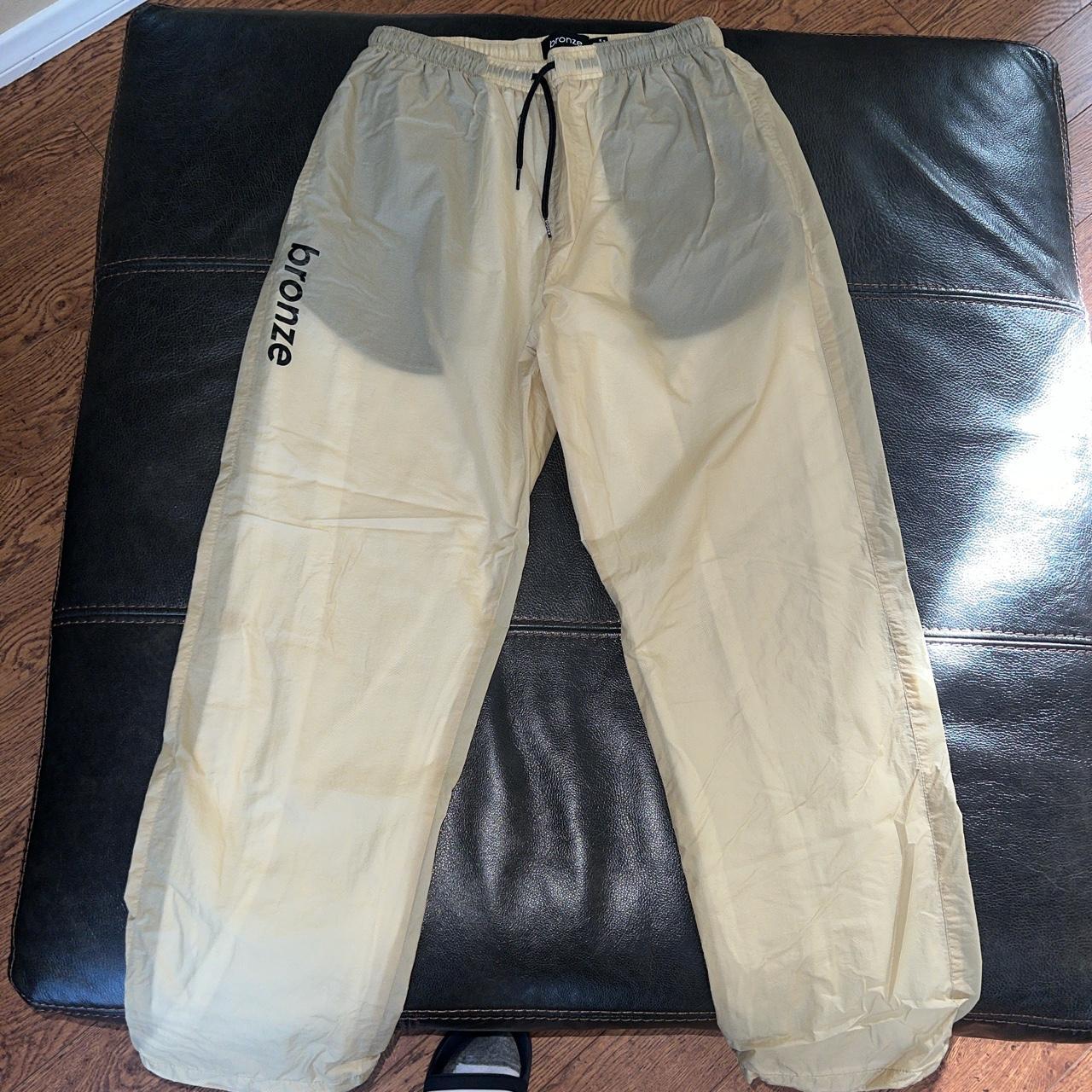 Bronze 56k track sales pants