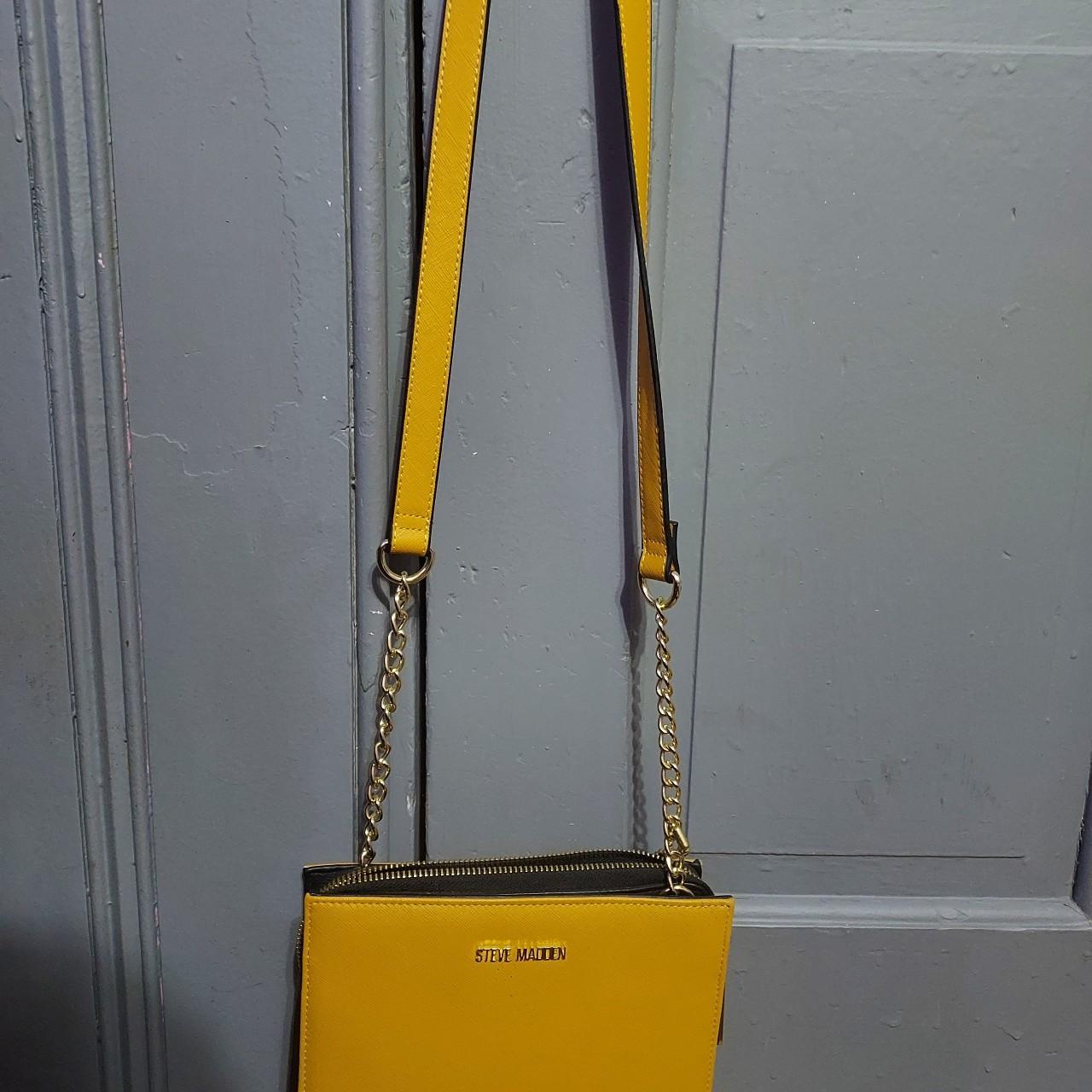 Small yellow Steve Madden cross body purse with gold... Depop
