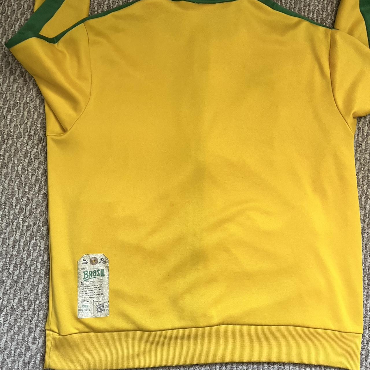 Puma Brazil track jacket has a couple of stains on