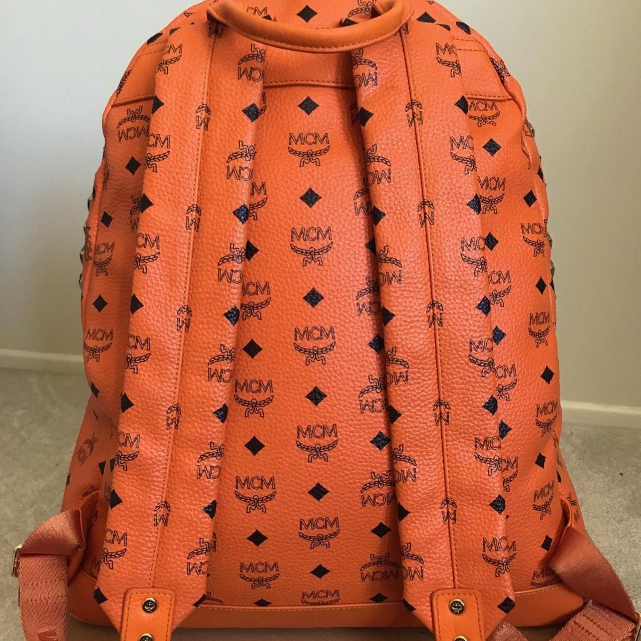 Orange mcm backpack best sale