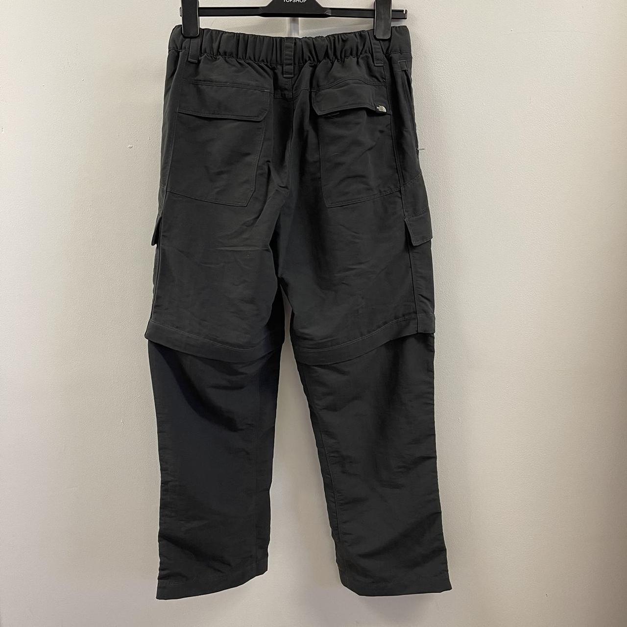 North Face cargo trousers. Men’s small could also... - Depop