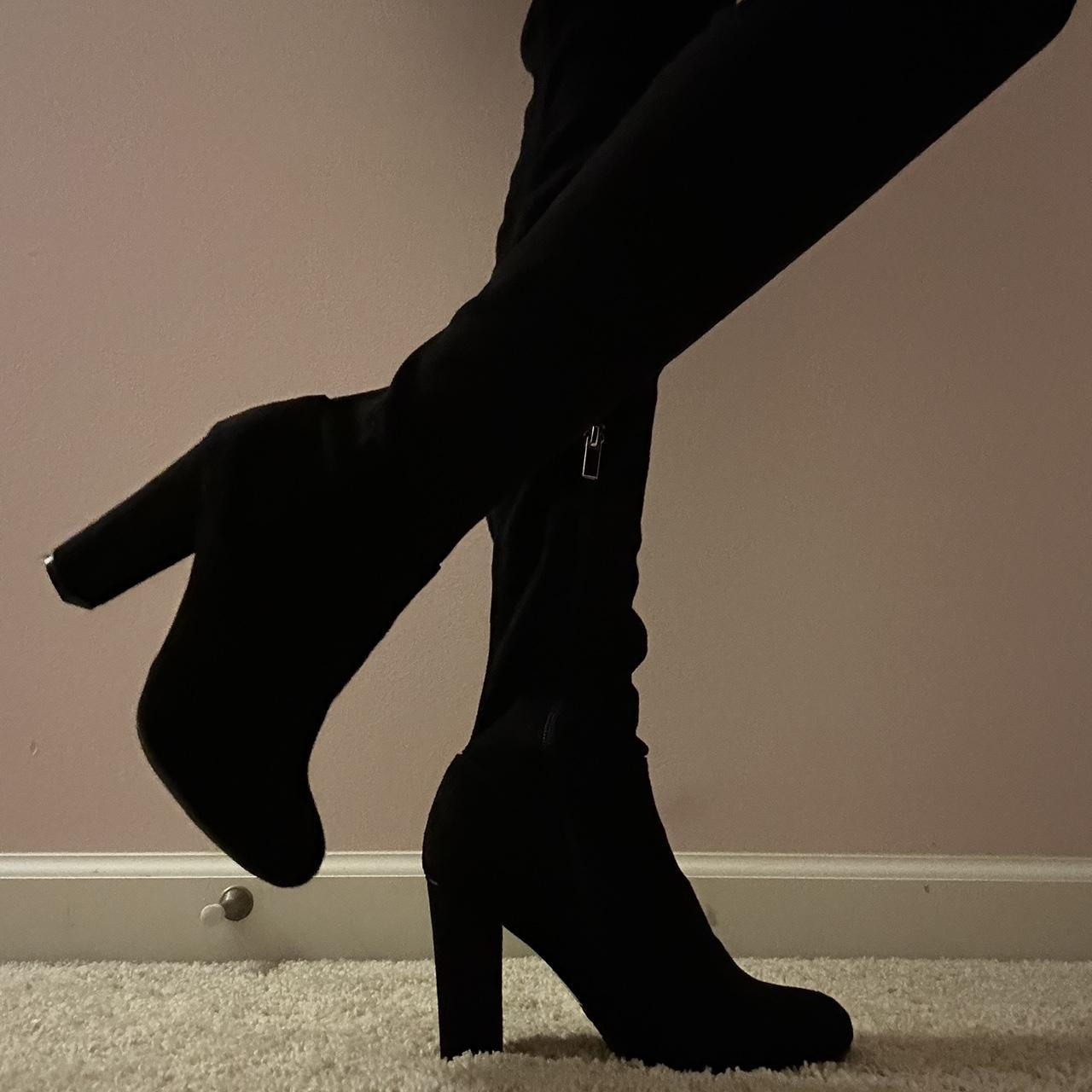 high rise black boots
