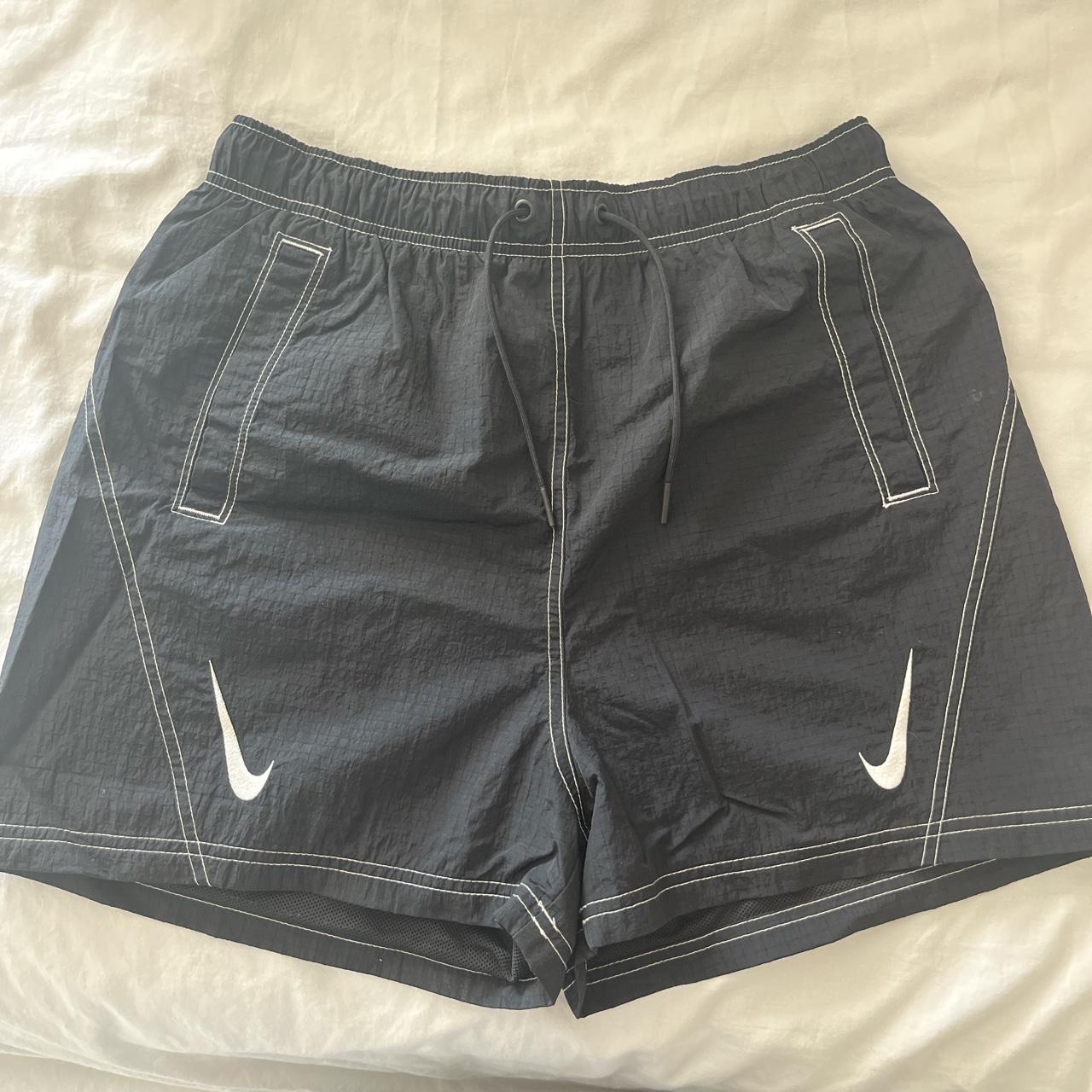 nike shorts black and gold