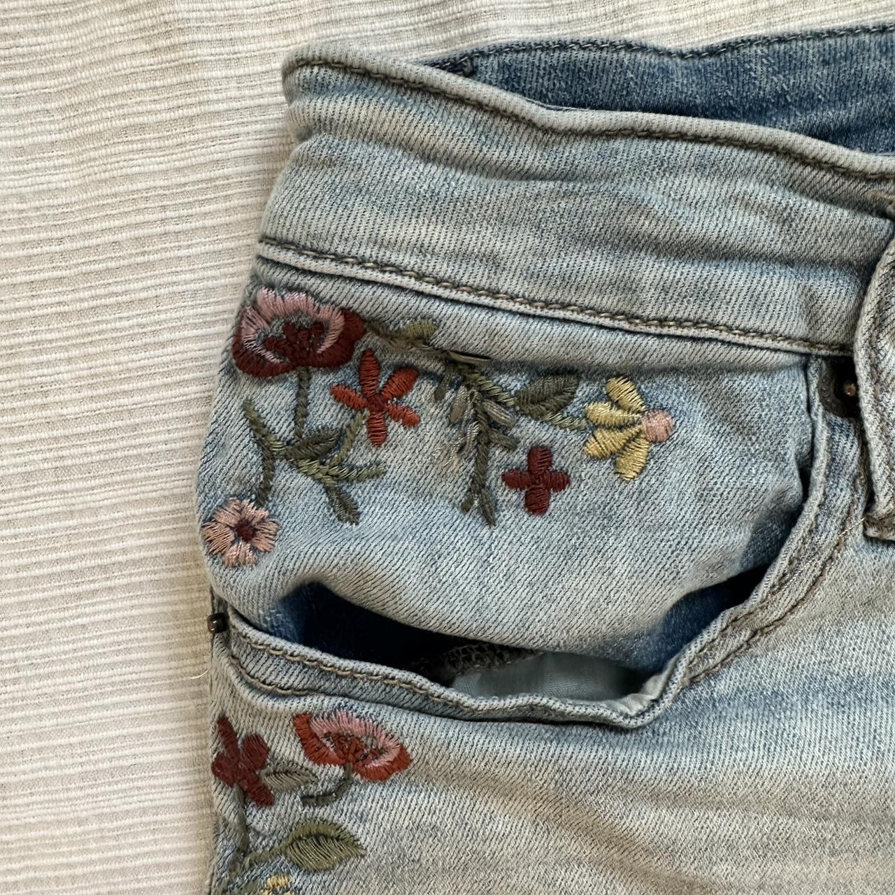 vintage flower detailed denim shorts modeled on a... - Depop