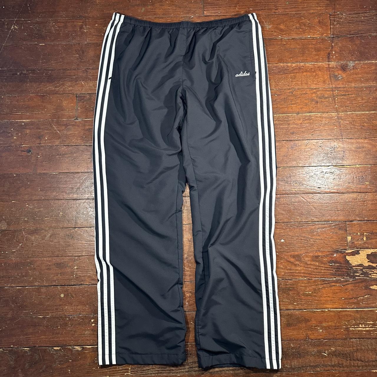 2000s Adidas cursive logo black track pants white... - Depop