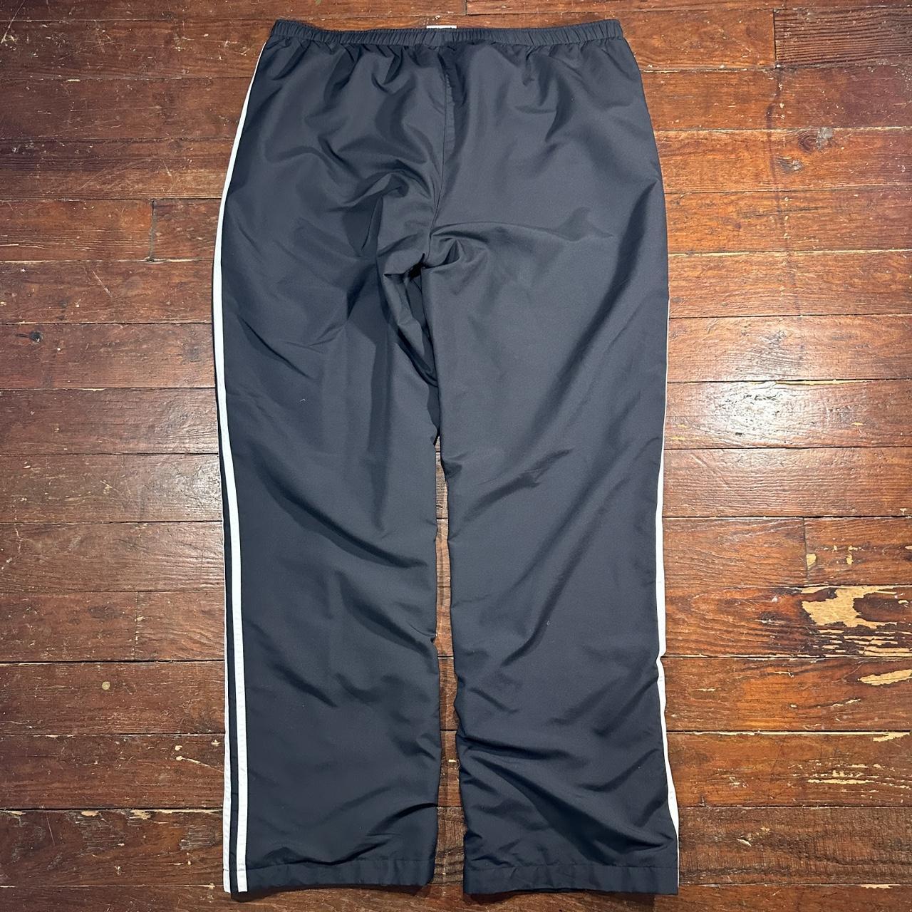 2000s Adidas cursive logo black track pants white... - Depop