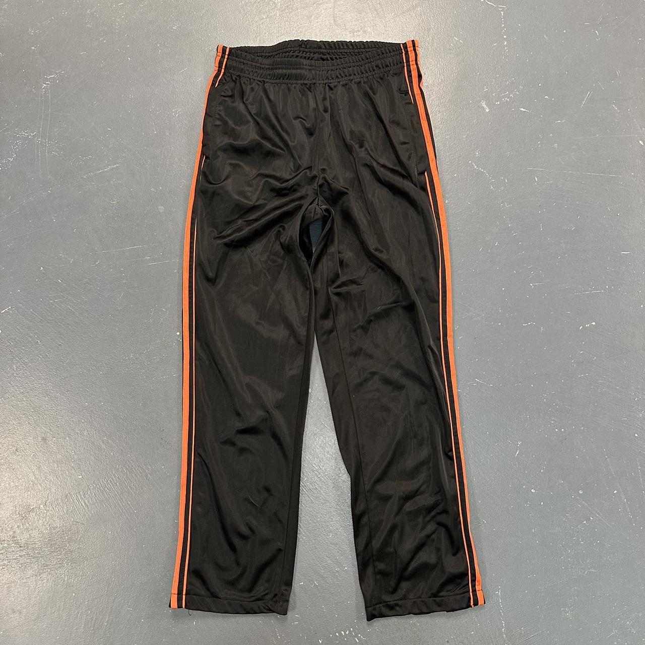 Baggy Black & Orange Active Joe Sweatpants Size... Depop