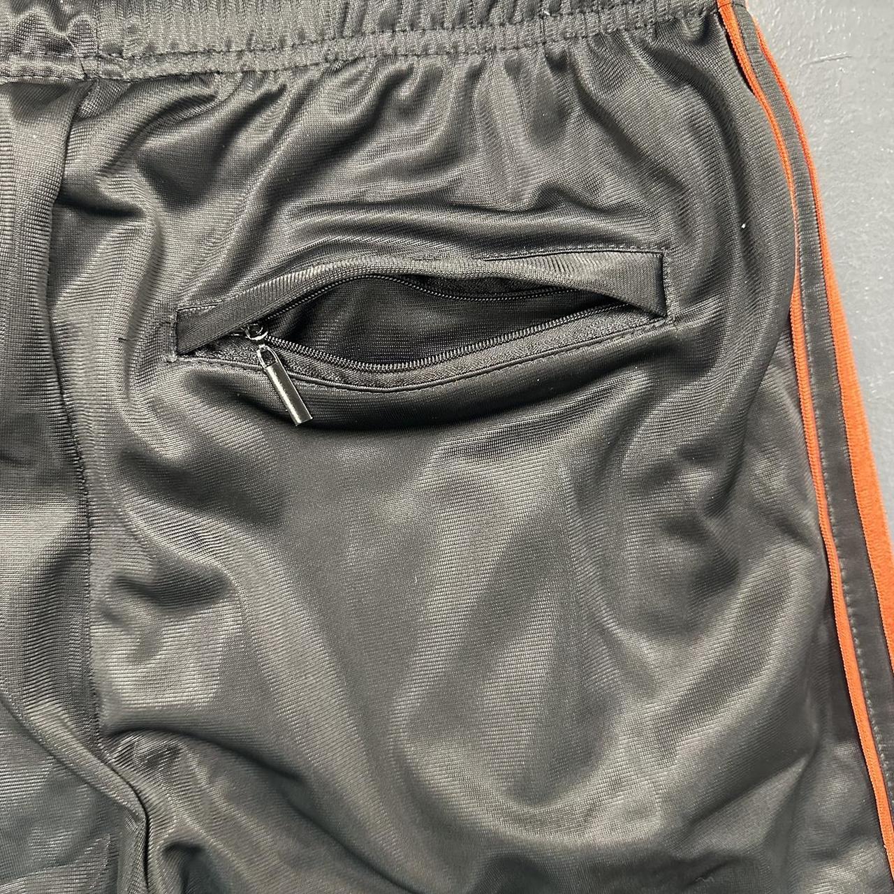 Baggy Black & Orange Active Joe Sweatpants Size... - Depop