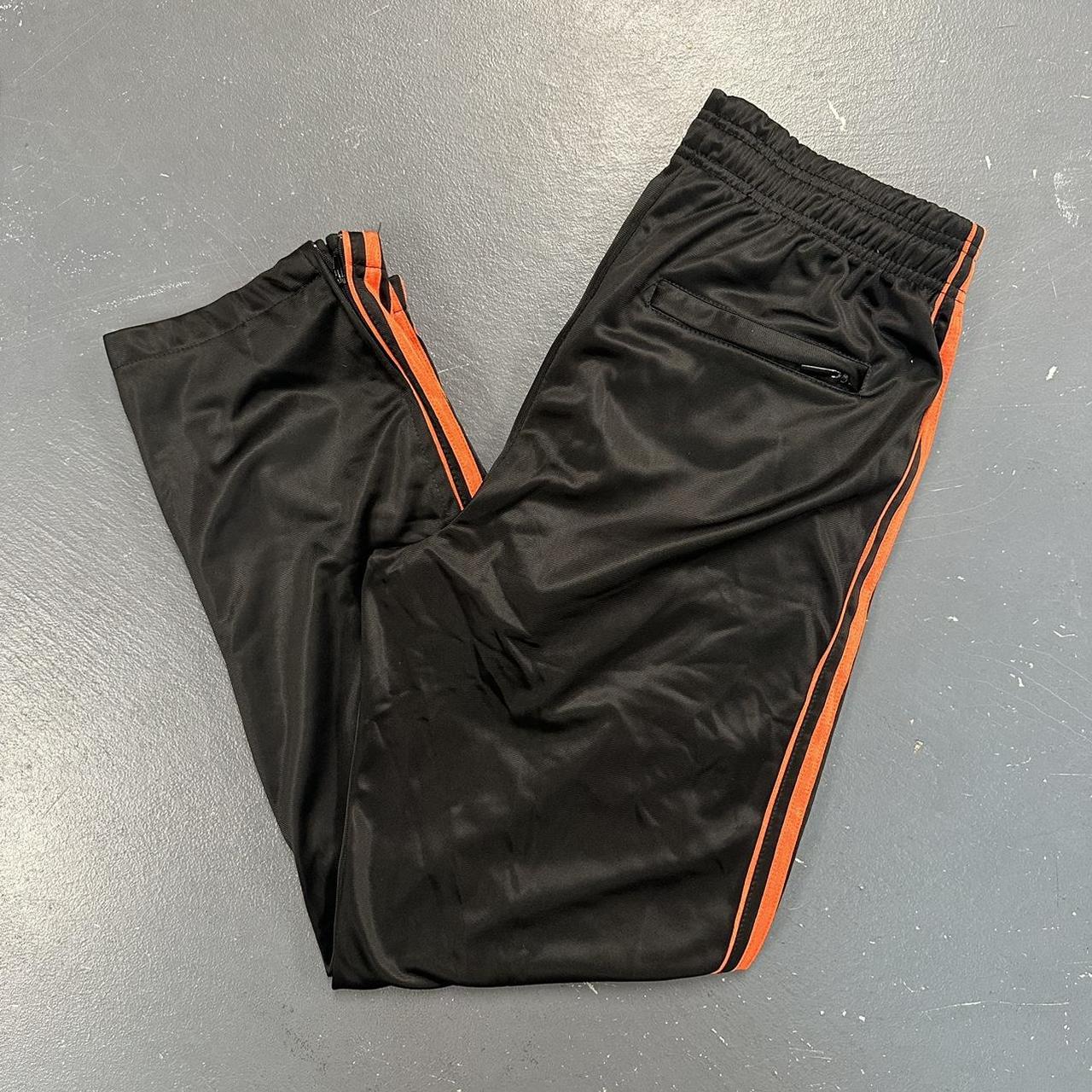 Baggy Black & Orange Active Joe Sweatpants Size... Depop