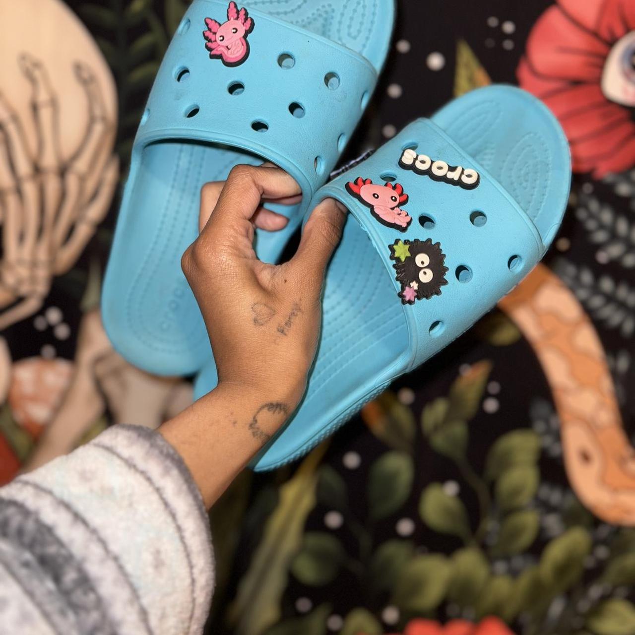 Blue Croc Slides; the jibbitz charms are included