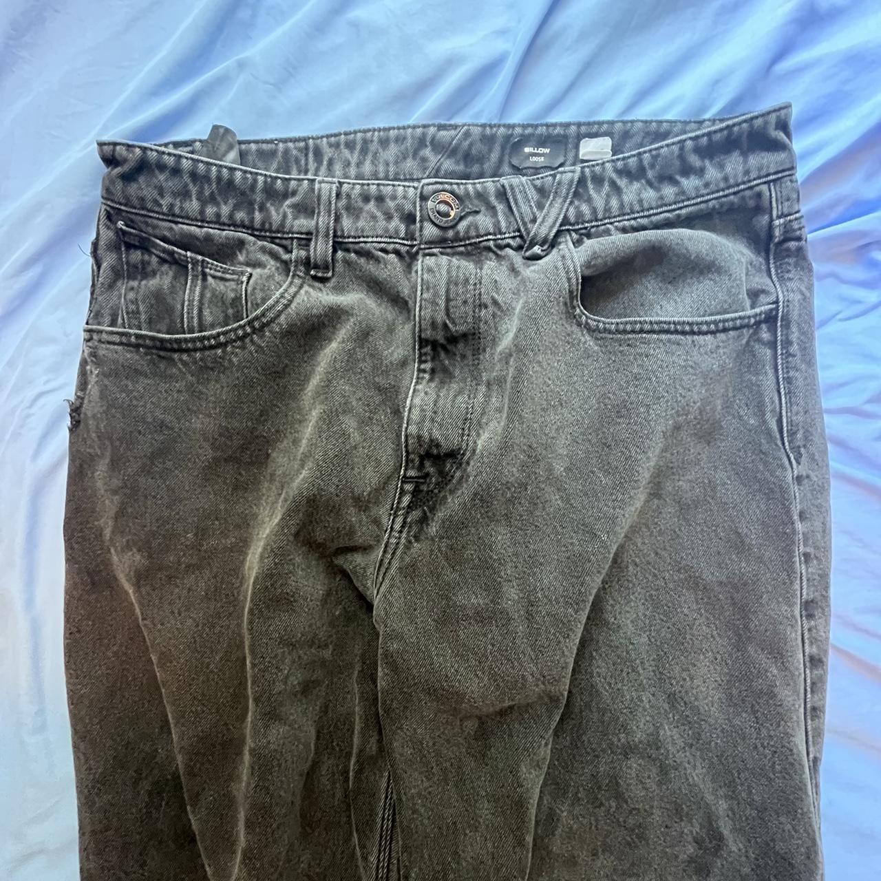 Volcom black baggy jeans damage on side and... - Depop