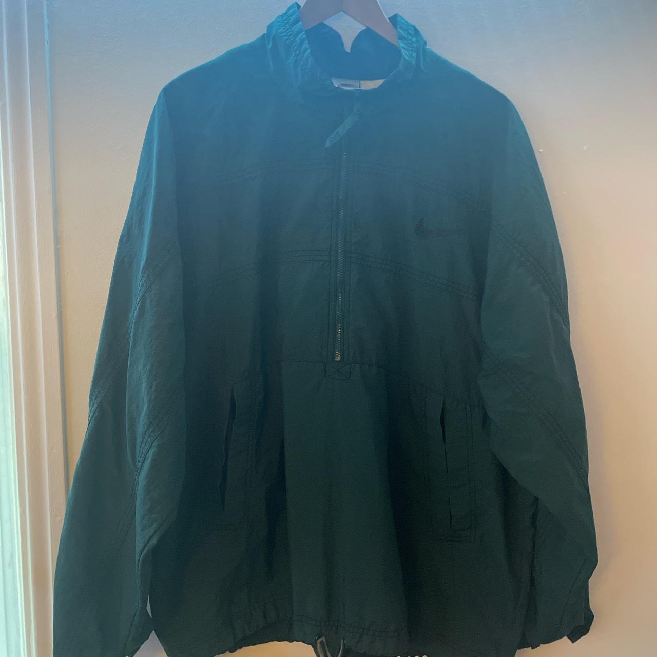 dark green nike windbreaker