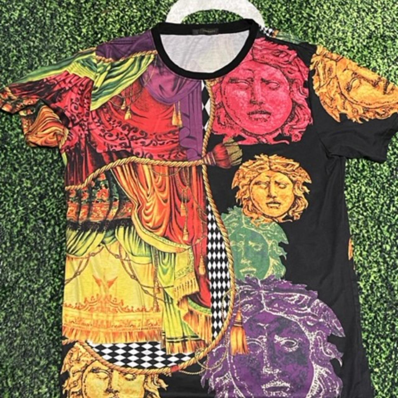 A Versace tee shirt with a graphic design allover... Depop