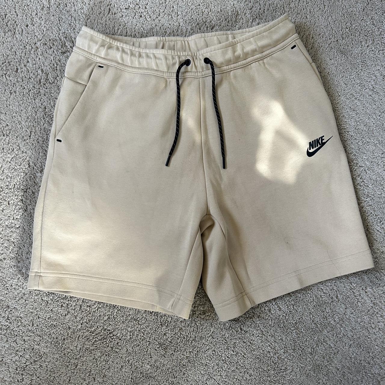 Cream Nike Tech Shorts Size M Purchased from Nike... - Depop