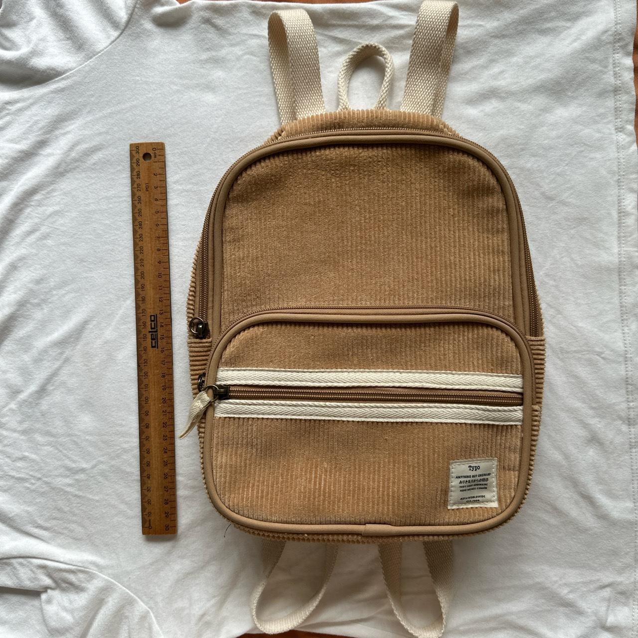 Typo Mini Backpack Please refer to photos as my. Depop