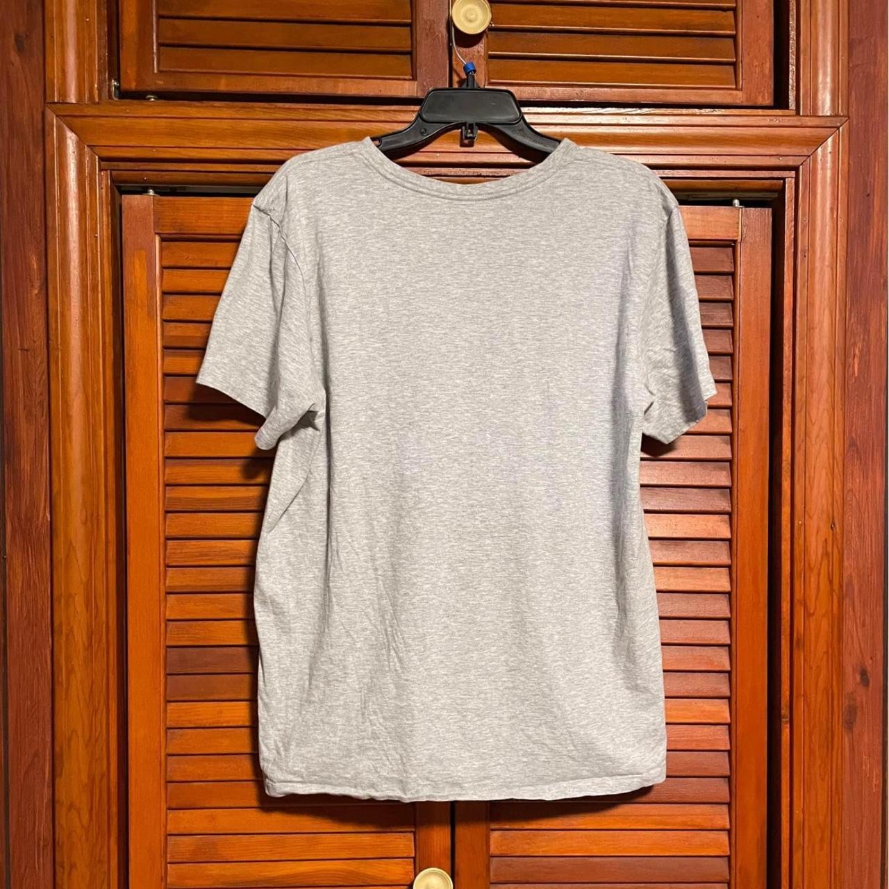 This is a grey v neck short sleeve t-shirt for men... - Depop