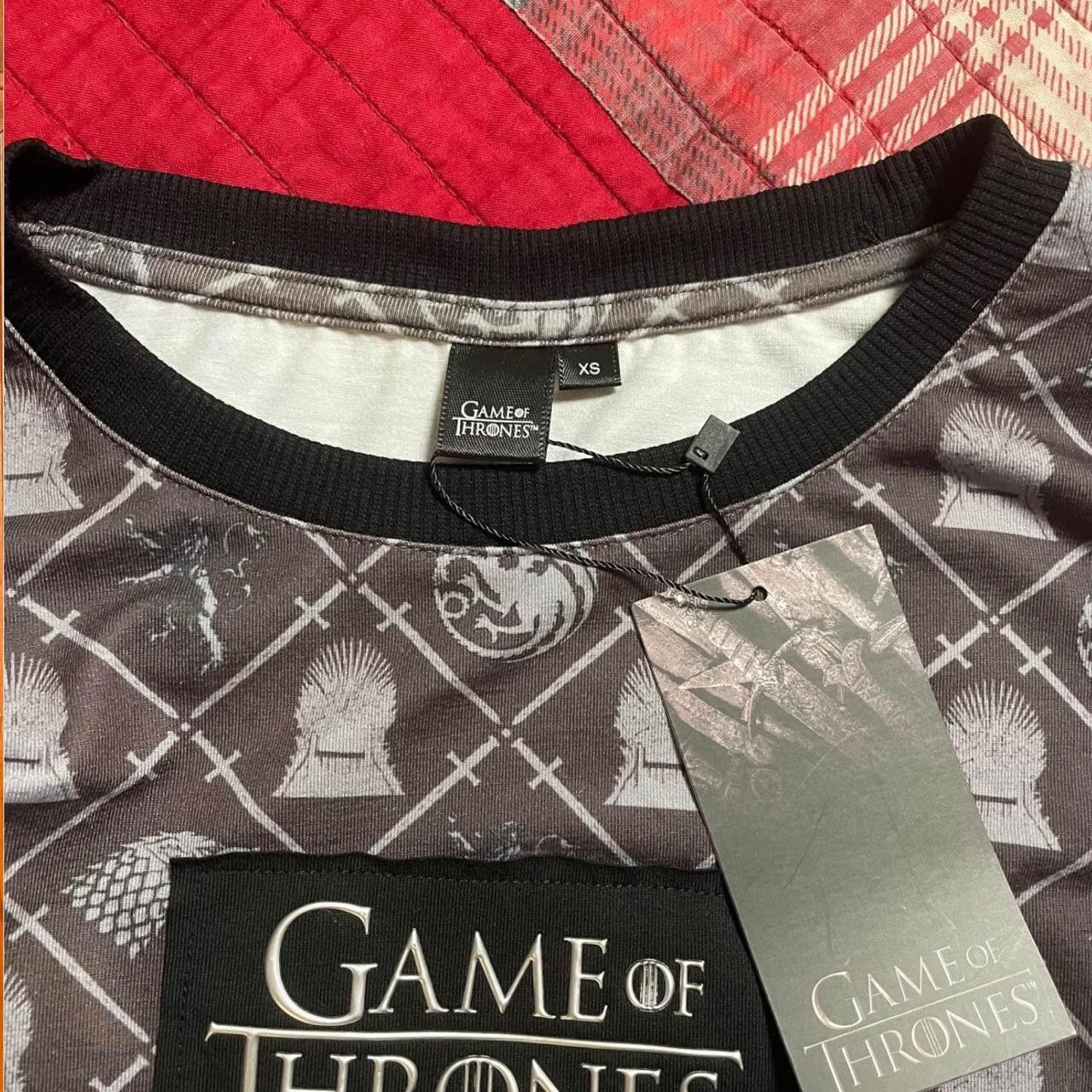 This is a Game of Thrones black and grey long sleeve...